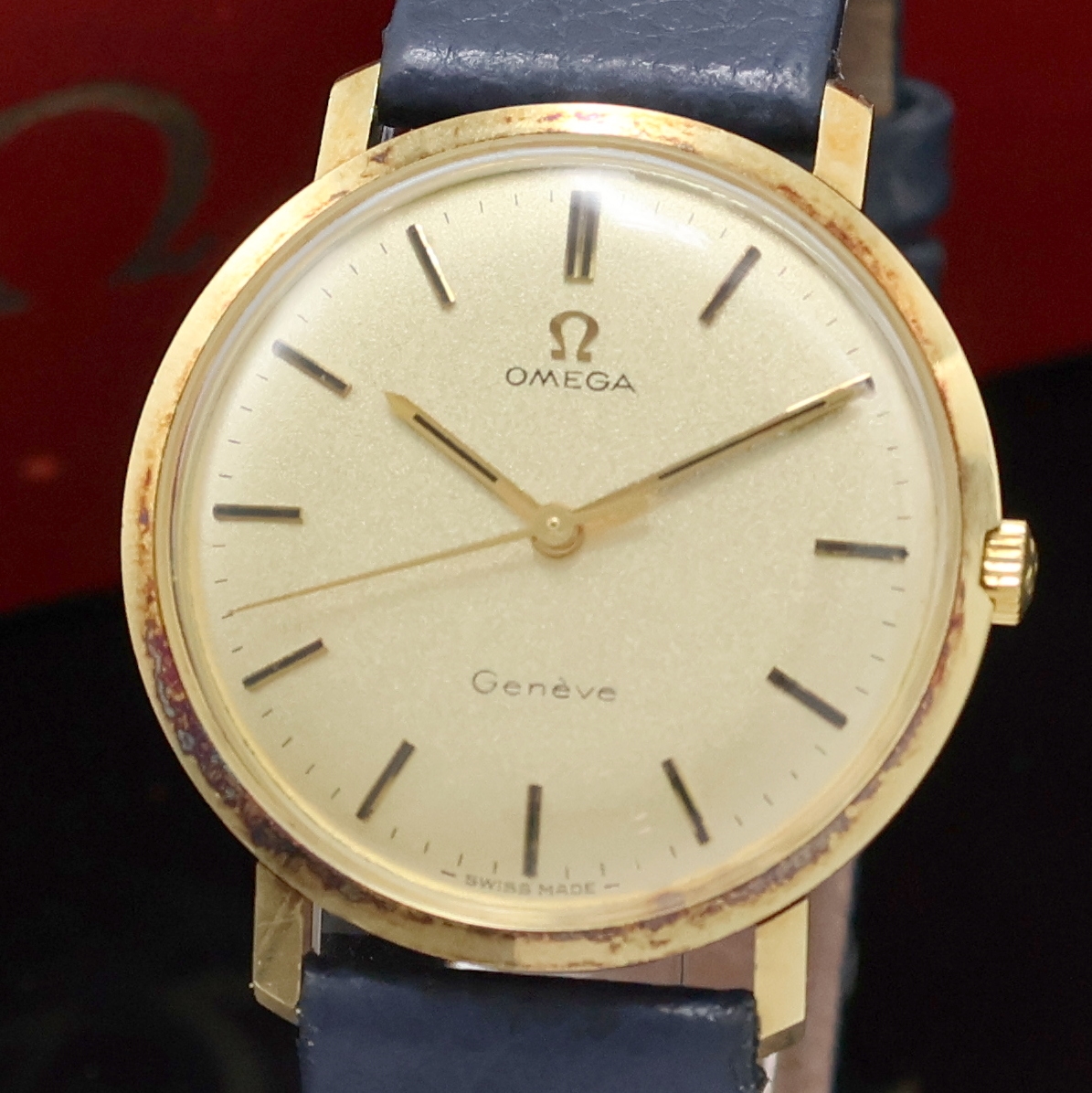 Detail a: OMEGA Geneve Armbanduhr in GG 585/000 Referenz 1317021, Schweiz um 1969, Handaufzug, 3- teil. Geh. (pat.) inkl. Lederband m. Dornschl., Boden u. ...