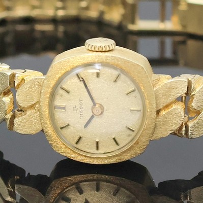 27018885a - TISSOT Damenarmbanduhr in GG 585/000, Schweiz um 1970, Handaufzug, 2-teil. viereckiges ...