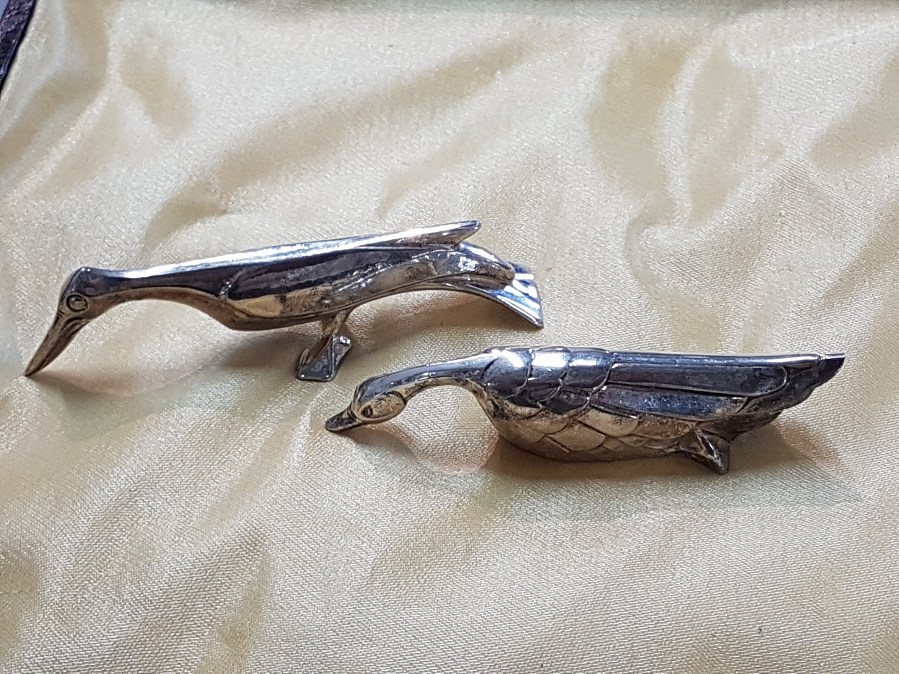 Detail j: 12 Messerbänkchen, Gallia, 20er Jahre, Metall versilbert, versch. Tiere, Art Deco, im orig. Etui, ca. 9-10 cm, l. Gebr.spuren