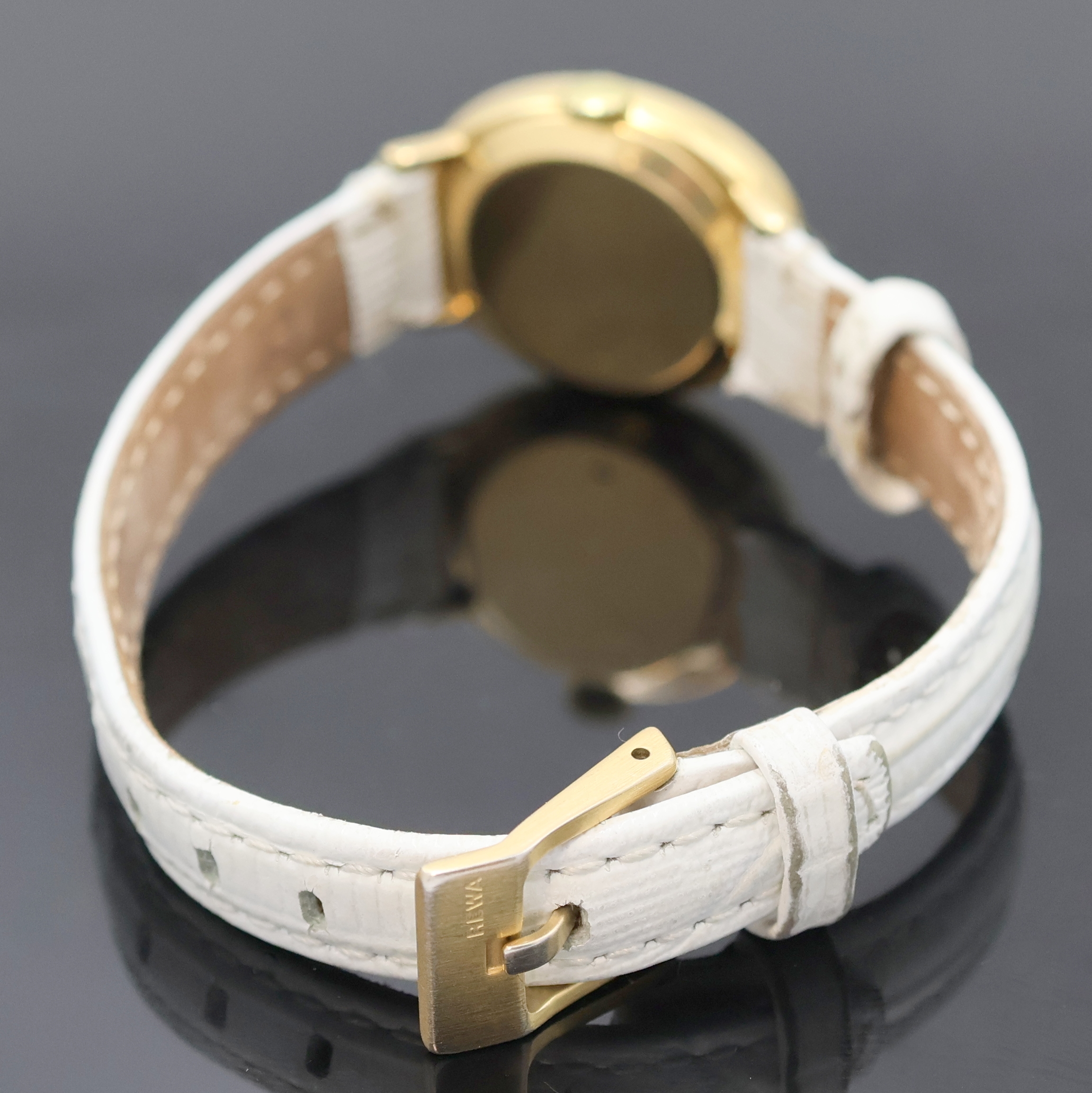 Detail c: CHOPARD Damenarmbanduhr in GG 750/000, Schweiz um 1980, Handaufzug, ovales 2-tlg. Geh., Boden aufgedr., Krone später, weißes Zifferbl., röm. ...