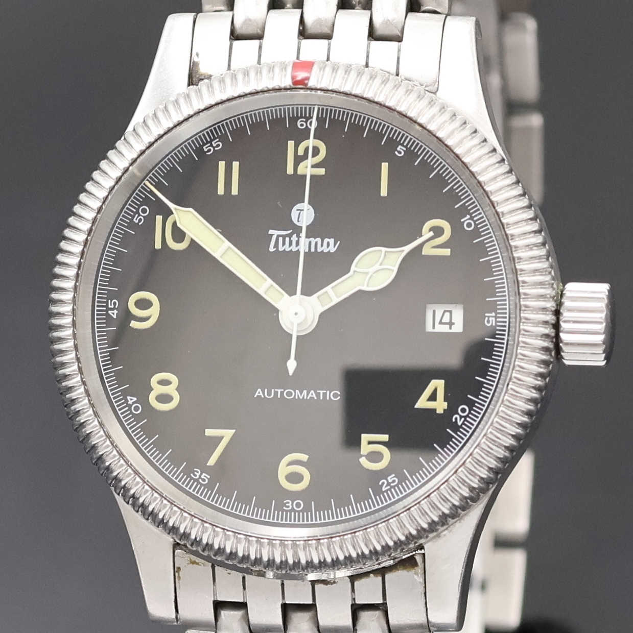 Detail a: TUTIMA Armbanduhr in Stahl, Deutschland um 1995, Automatik, orig. Gliederband m. dopp. Faltschl., Lün. beids. drehb., Boden u. Krone verschr., ...