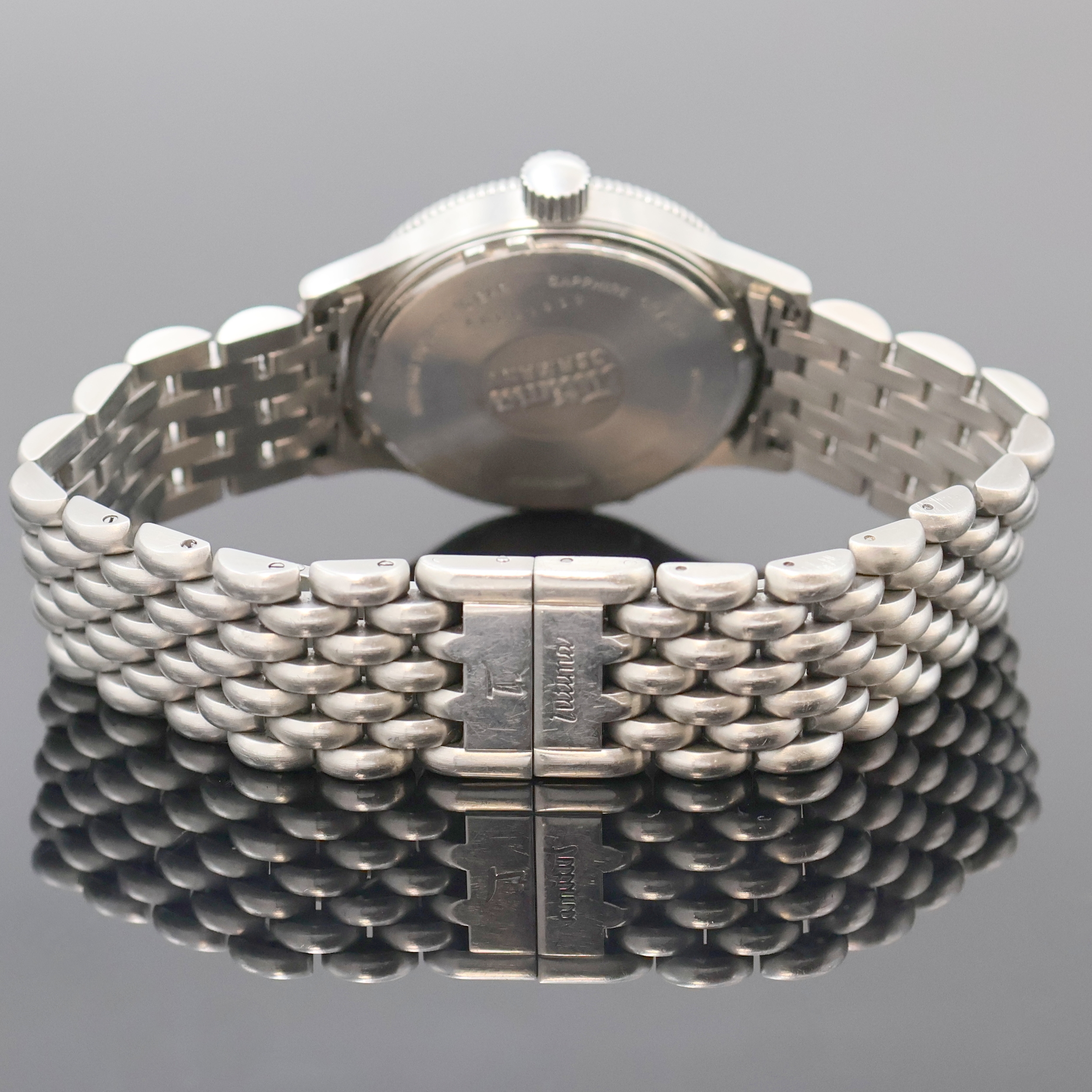 Detail c: TUTIMA Armbanduhr in Stahl, Deutschland um 1995, Automatik, orig. Gliederband m. dopp. Faltschl., Lün. beids. drehb., Boden u. Krone verschr., ...