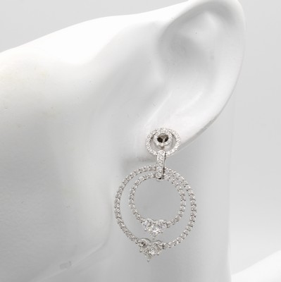 27020290a - Paar Ohrstecker mit Diamanten und Brillanten ´invisible setting´, WG 750/000, Diam. u. ...