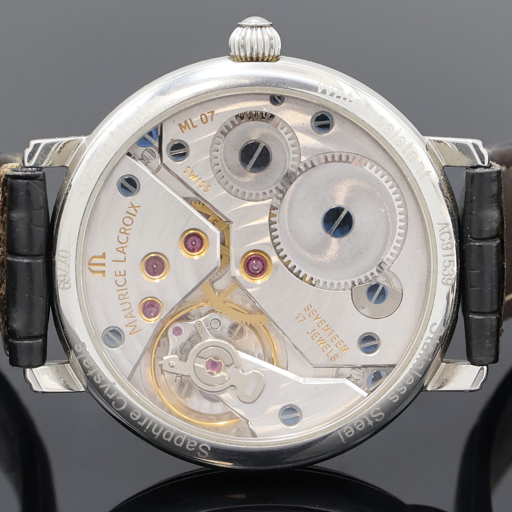 Detail e: MAURICE LACROIX Herrenarmbanduhr Jour Et Nuit Referenz 07769, Schweiz um 2010, Handaufzug, beids. vergl. Edelstahlgeh., Boden aufgedr., orig. ...