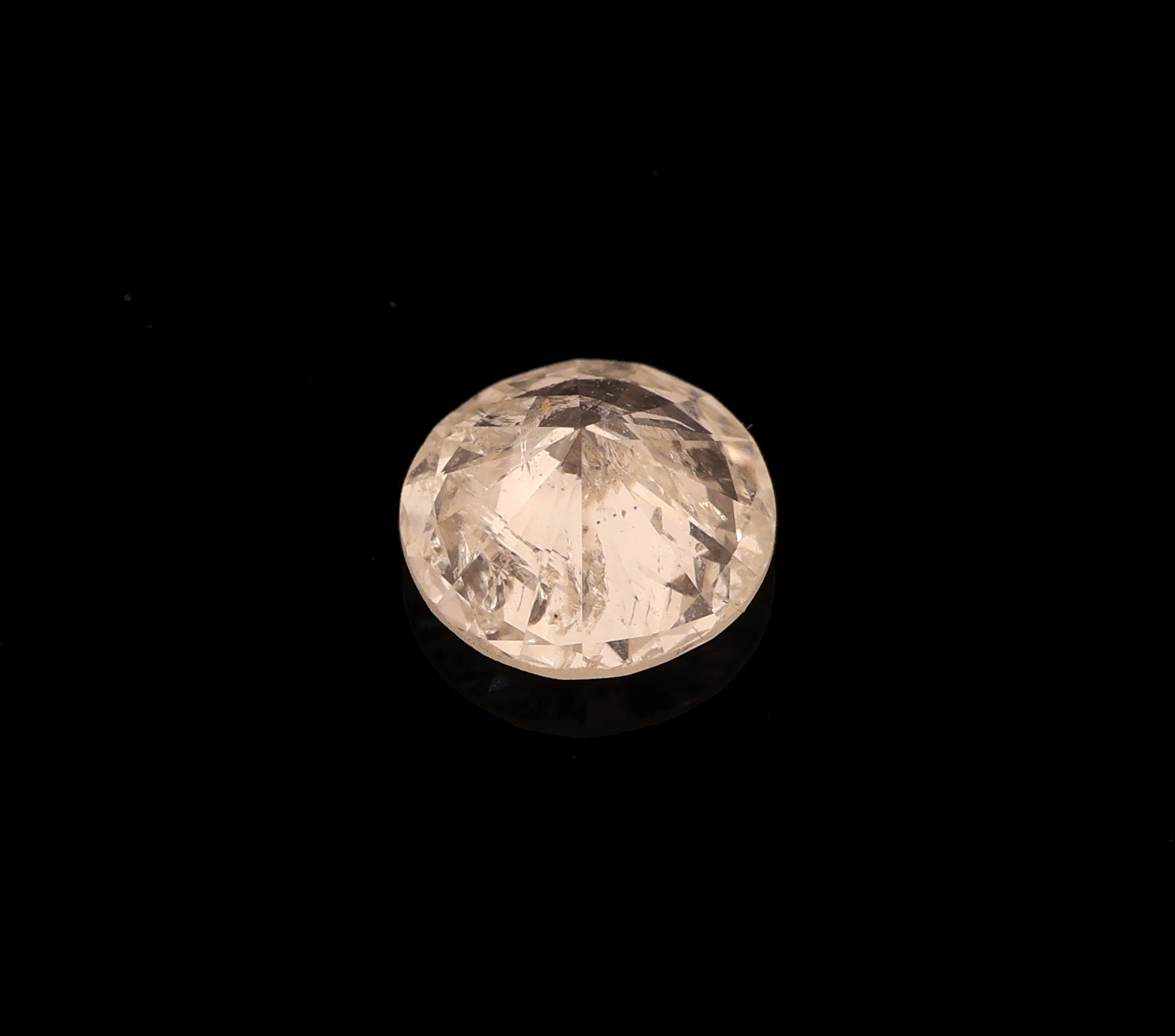 Detail a: Loser Brillant, ca. 0.58 ct light yellow/p1