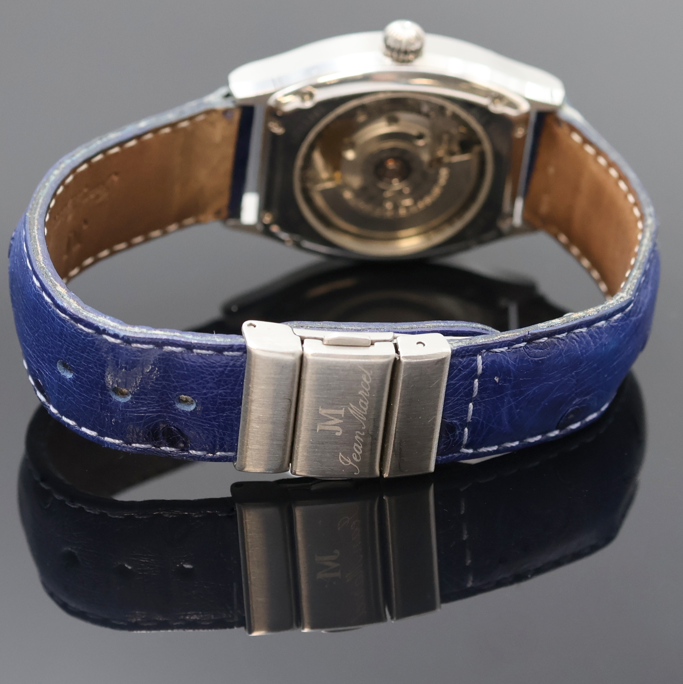 Detail c: JEAN MARCEL Herrenarmbanduhr mit wandernder springender Stunde Referenz 160.158, Schweiz um 1995, Automatik, tonneauförmiges, beids. vergl. ...