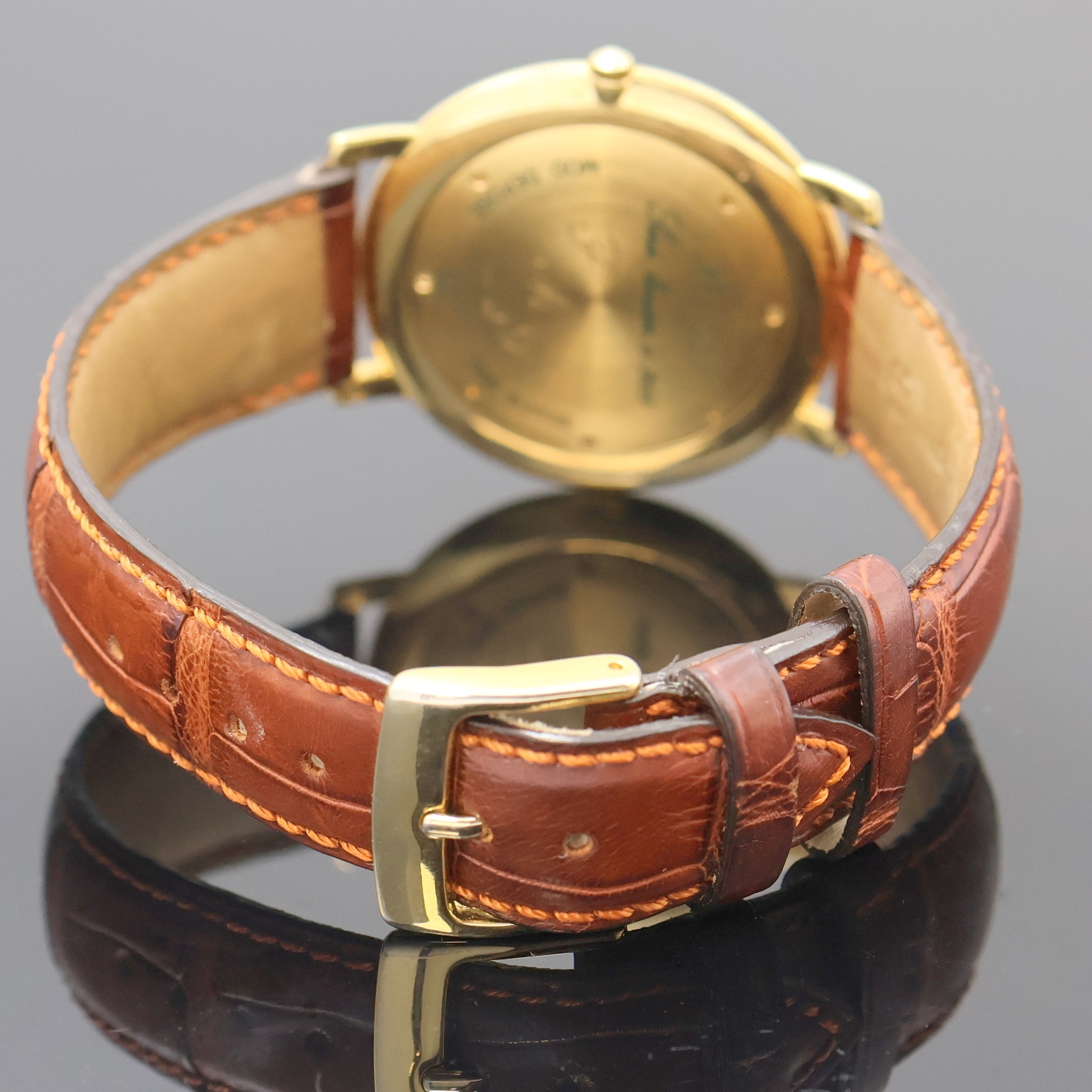 Detail c: PAUL PICOT auf 200 Stück limitierte Herrenarmbanduhr in GG 750/000, Schweiz um 2000, Automatik, Boden m. Monogramm 7-fach verschr., silb. Zifferbl. ...