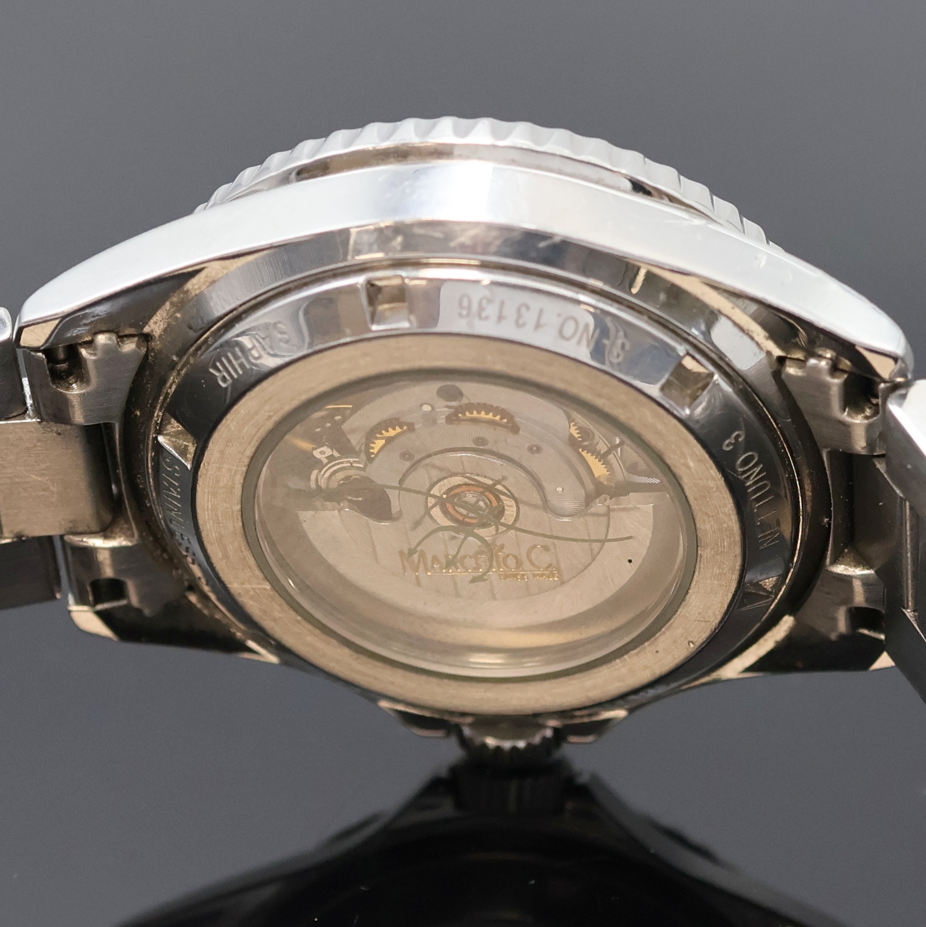 Detail e: MARCELLO C Herrenarmbanduhr Nettuno 3 Referenz 2007, Schweiz um 2010, Automatik, beids. vergl. Edelstahlgeh. inkl. orig. Gliederband m. Faltschl., ...