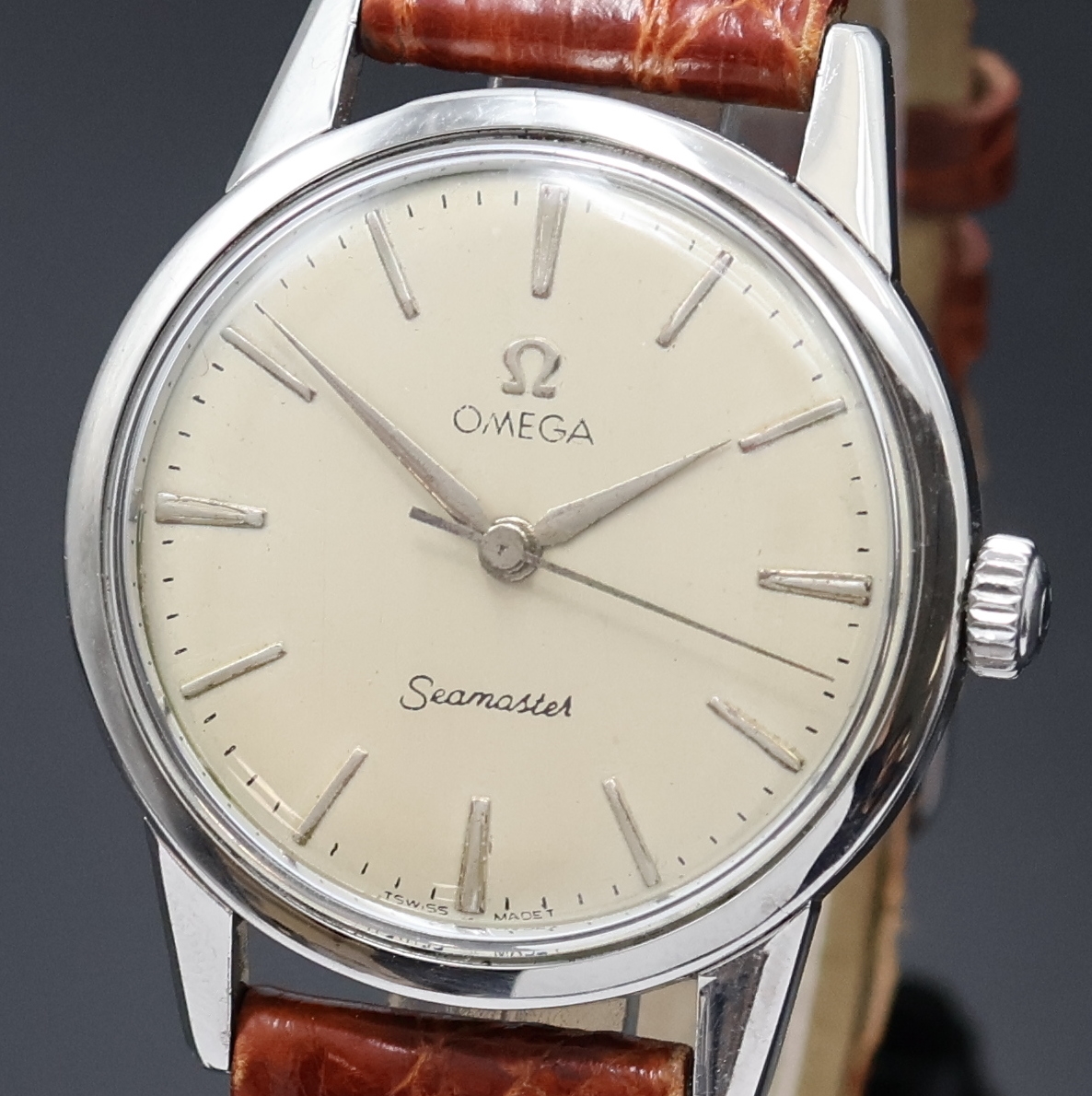 Detail a: OMEGA Seamaster Armbanduhr Referenz 14390-8-SC, Schweiz um 1962, Handaufzug, Edelstahlgeh., Boden verschr., silb. Zifferbl. m. silb. Std.-Ind. u. ...