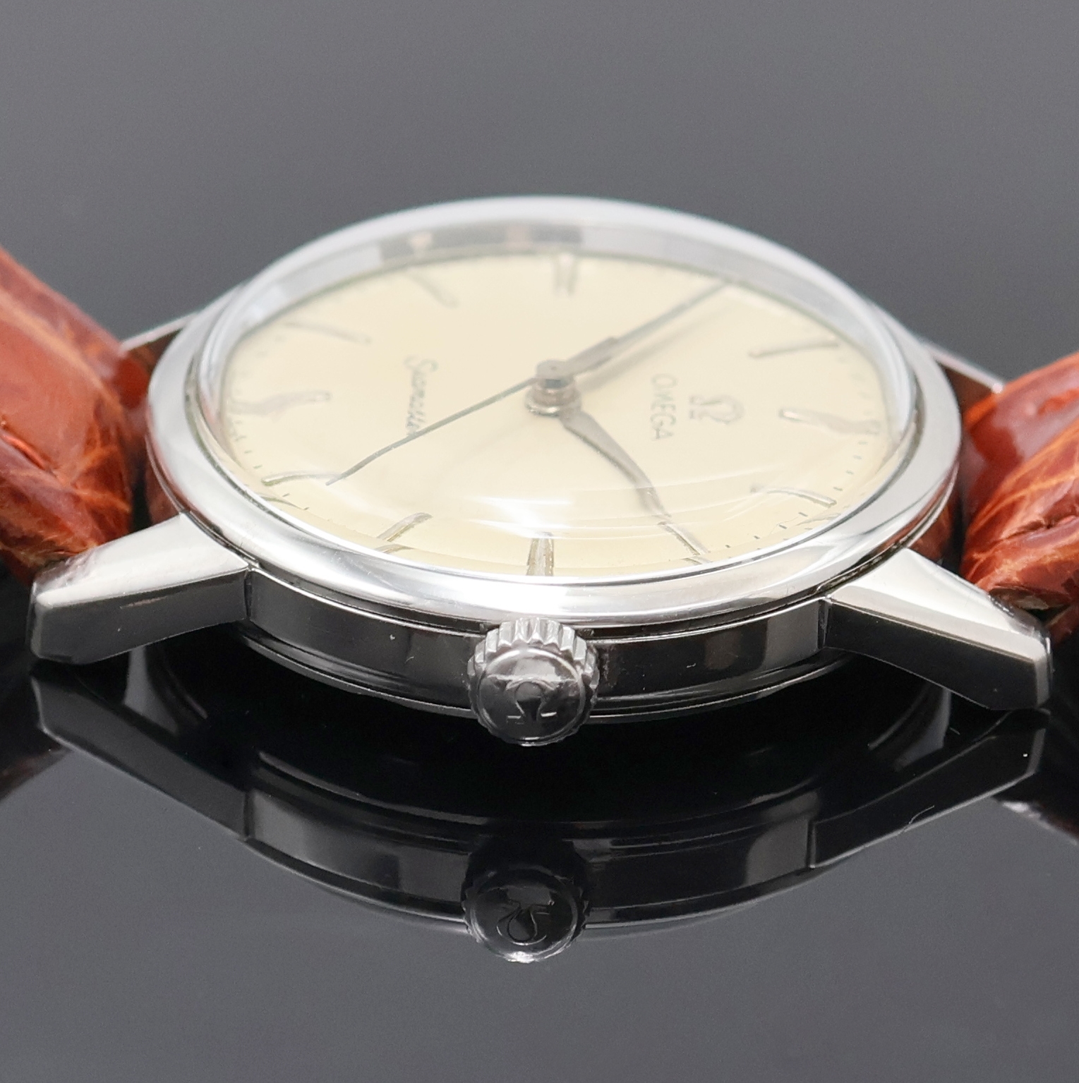 Detail c: OMEGA Seamaster Armbanduhr Referenz 14390-8-SC, Schweiz um 1962, Handaufzug, Edelstahlgeh., Boden verschr., silb. Zifferbl. m. silb. Std.-Ind. u. ...