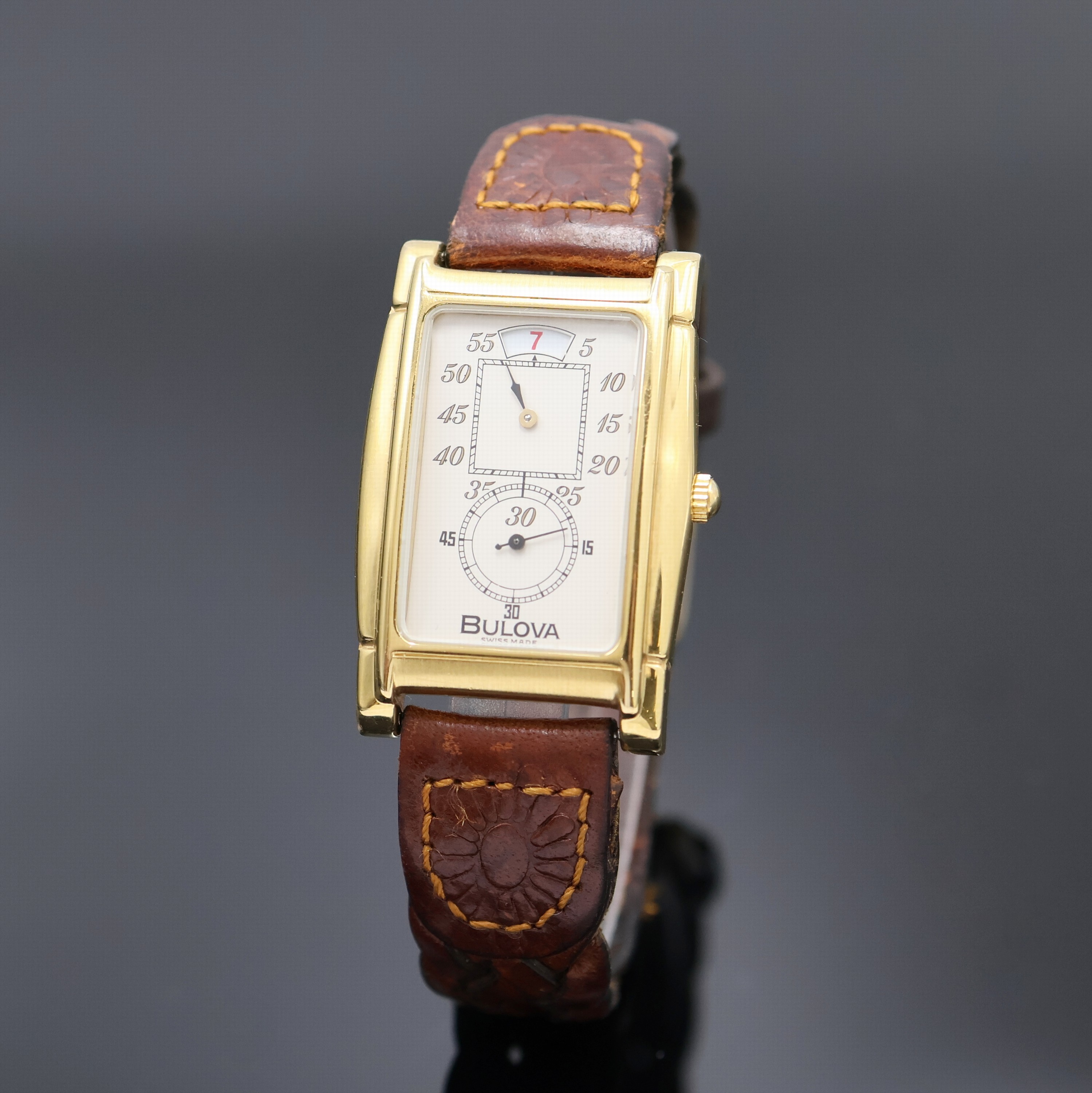 Image 27020660 - BULOVA vergoldete Armbanduhr mit springender Stunde Referenz 8.098.1.0.10, Schweiz um ...