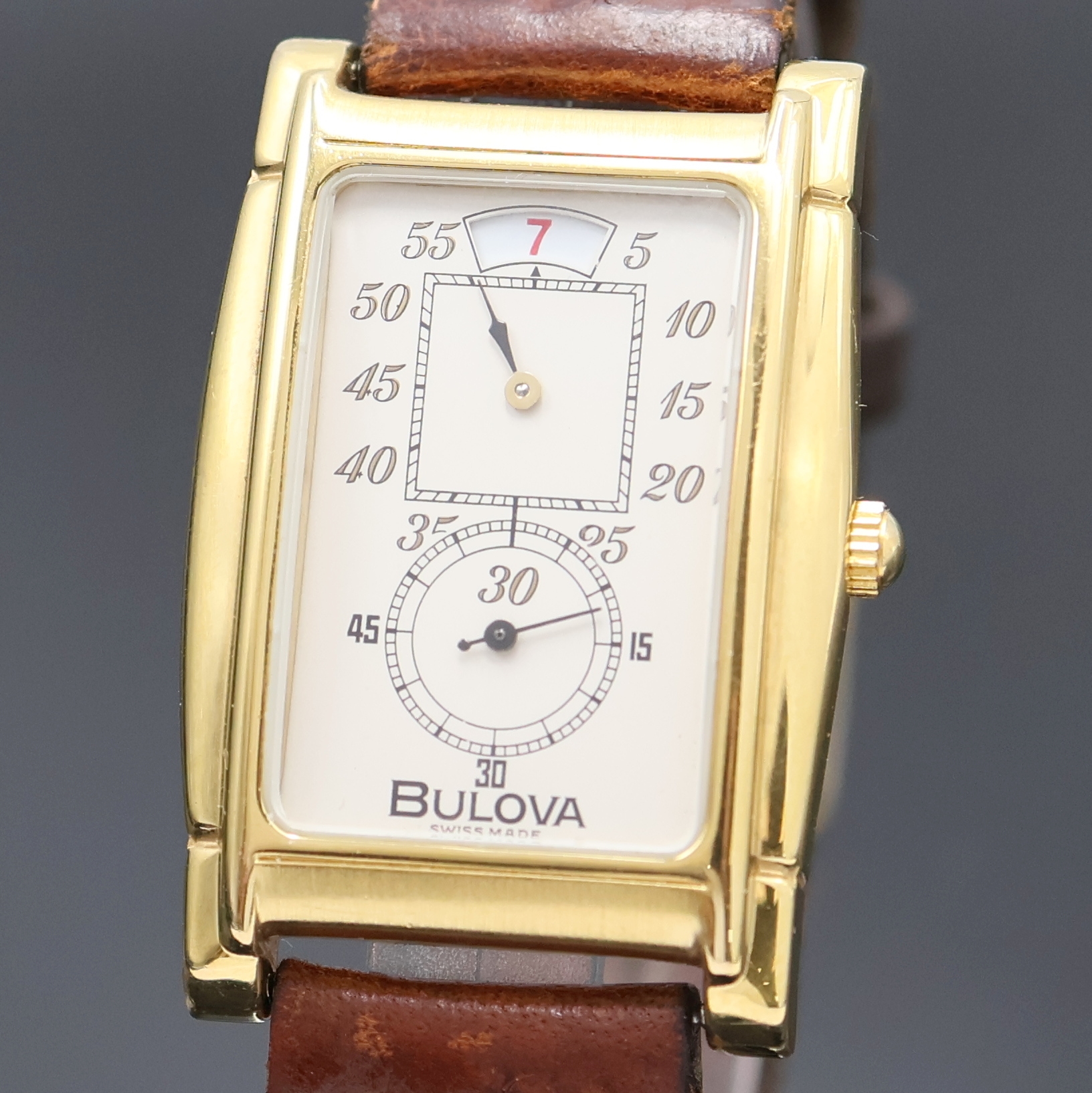 Detail a: BULOVA vergoldete Armbanduhr mit springender Stunde Referenz 8.098.1.0.10, Schweiz um 1990, Handaufzug, beids. vergl. Geh., Stahlboden aufgedr., ...