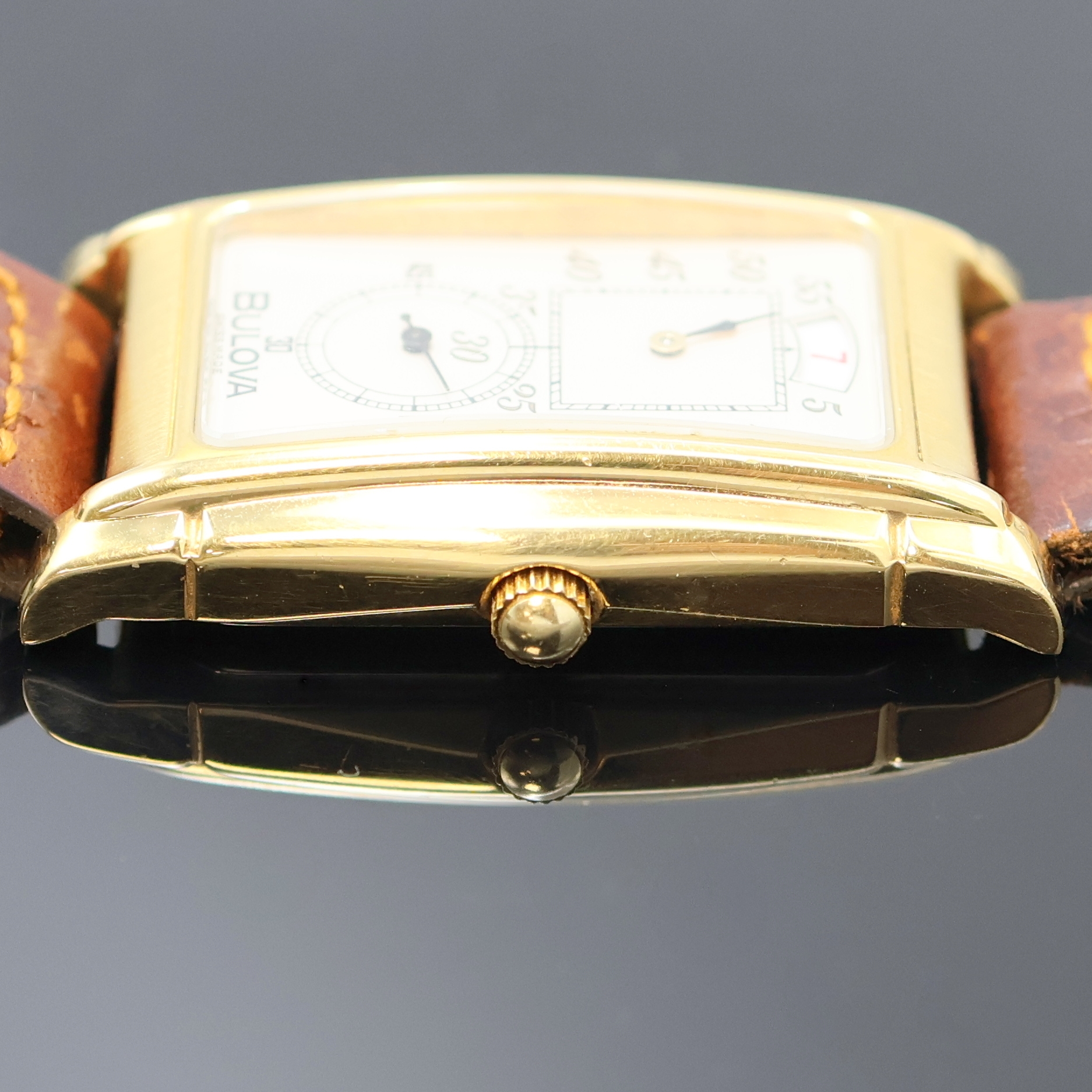 Detail c: BULOVA vergoldete Armbanduhr mit springender Stunde Referenz 8.098.1.0.10, Schweiz um 1990, Handaufzug, beids. vergl. Geh., Stahlboden aufgedr., ...
