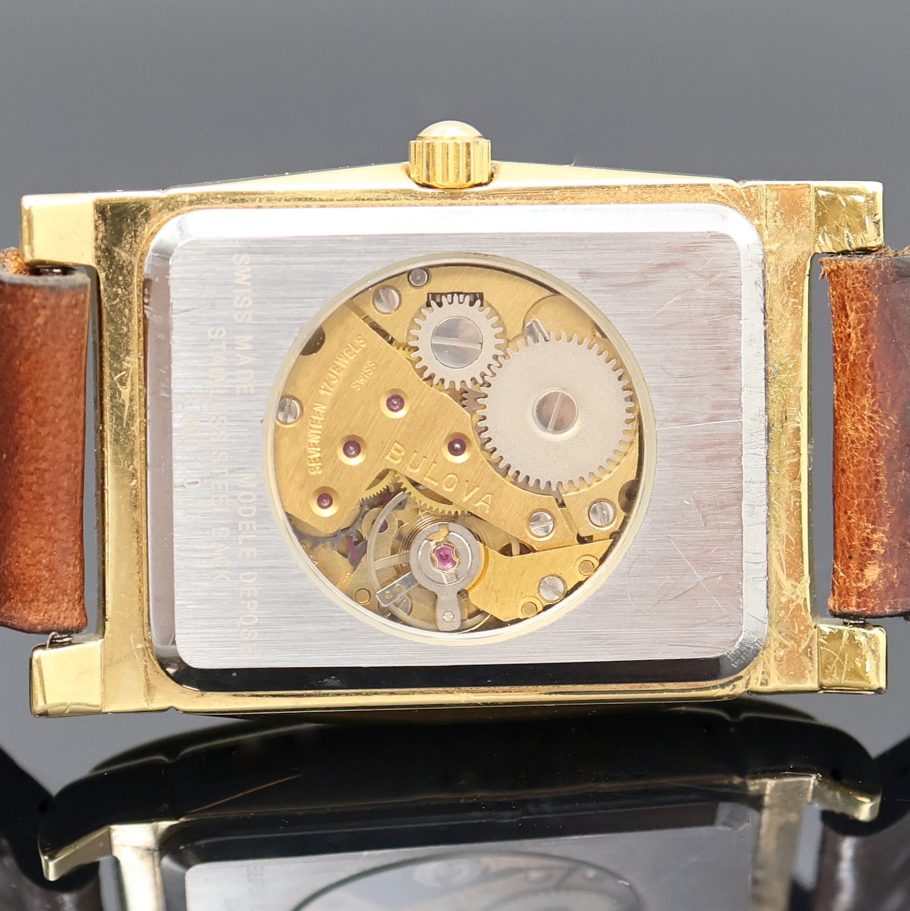 Detail d: BULOVA vergoldete Armbanduhr mit springender Stunde Referenz 8.098.1.0.10, Schweiz um 1990, Handaufzug, beids. vergl. Geh., Stahlboden aufgedr., ...