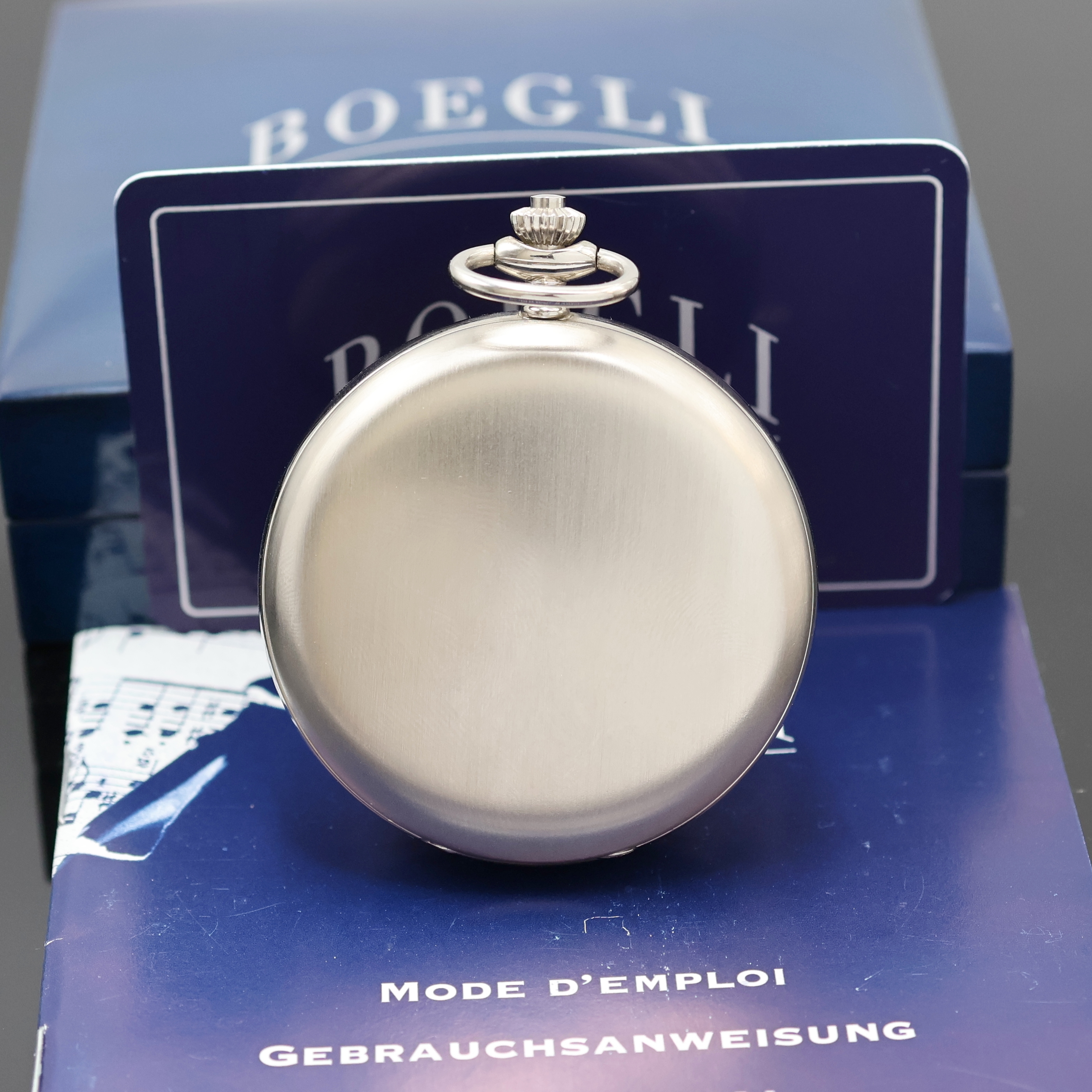 Detail a: BOEGLI / REUGE Taschenuhr mit Spielwerk der Melodie die Zauberflöte von Mozart, Schweiz verk. lt. beil. Pap. 11/2012, Handaufzug, rücks. Aufzug des ...