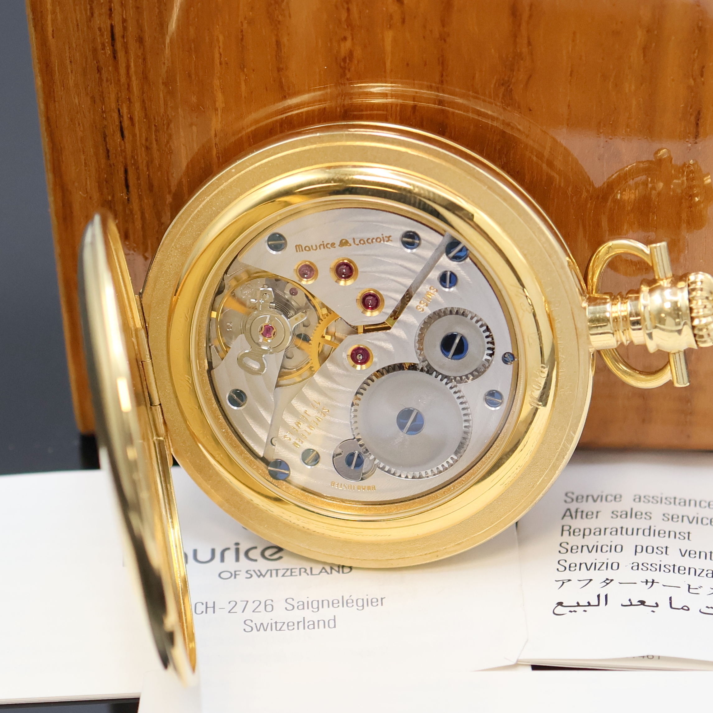 Detail c: MAURICE LACROIX vergoldete Savonette Referenz 65415, Schweiz verk. lt. beil. Pap. 06/1993, Handaufzug, glattes Geh., blaues Zifferbl. m.gold. u. ...