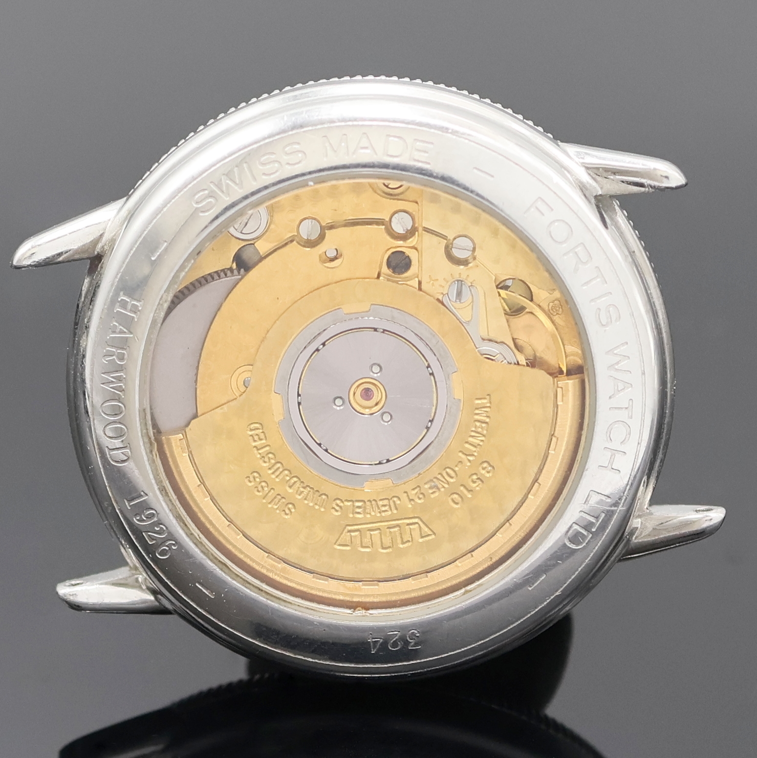 Detail c: HARWOOD / FORTIS Armbanduhr in Stahl, Schweiz um 1990, beids. vergl. Geh., Boden aufgedr., Zeigerstellung patent. v. Harwood 1926 durch drehen der ...