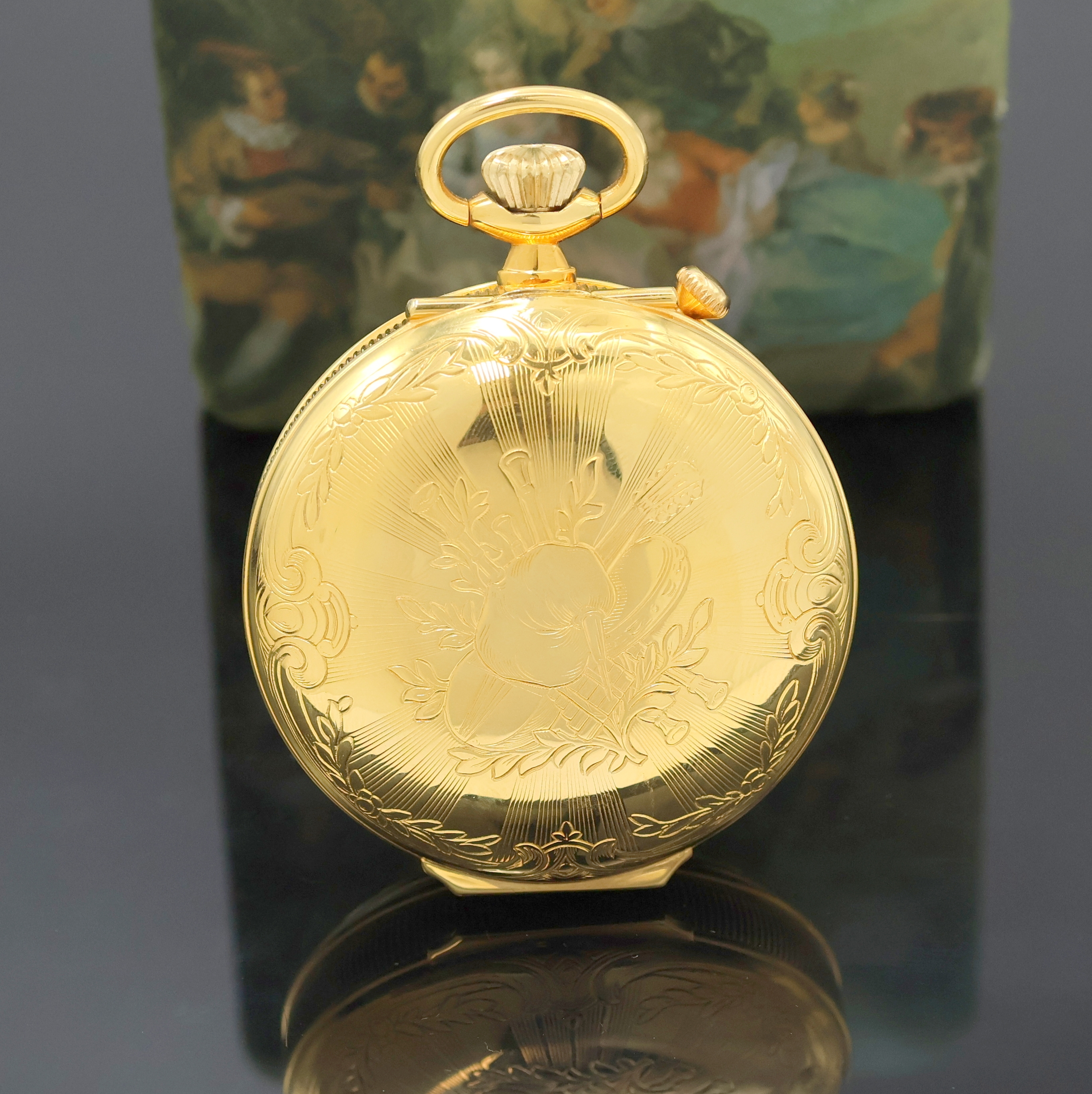 Detail b: REUGE Taschenuhr mit Wecker-Spieluhr und Figurenautomat, Schweiz um 1990, verg. Geh., Rückdeckel m. grav. Musikinstrumenten, weißes Zifferbl. b. ...