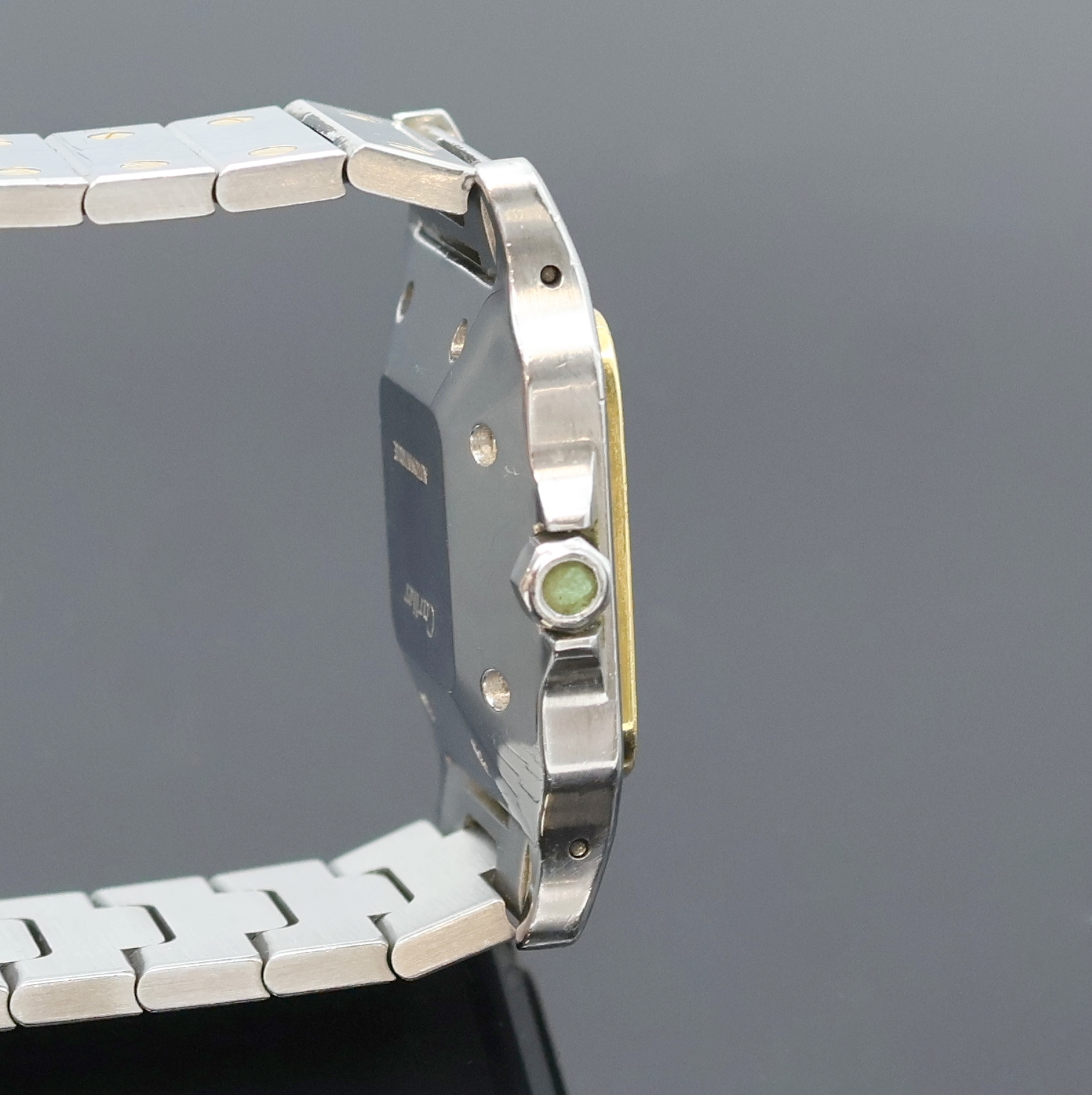 Detail d: CARTIER Santos Herrenarmbanduhr in Edelstahl/Gold, Schweiz um 1990, Automatik, Monocoque-Geh., orig. Gliederband m. dopp. Faltschl., Schmuckkrone ...
