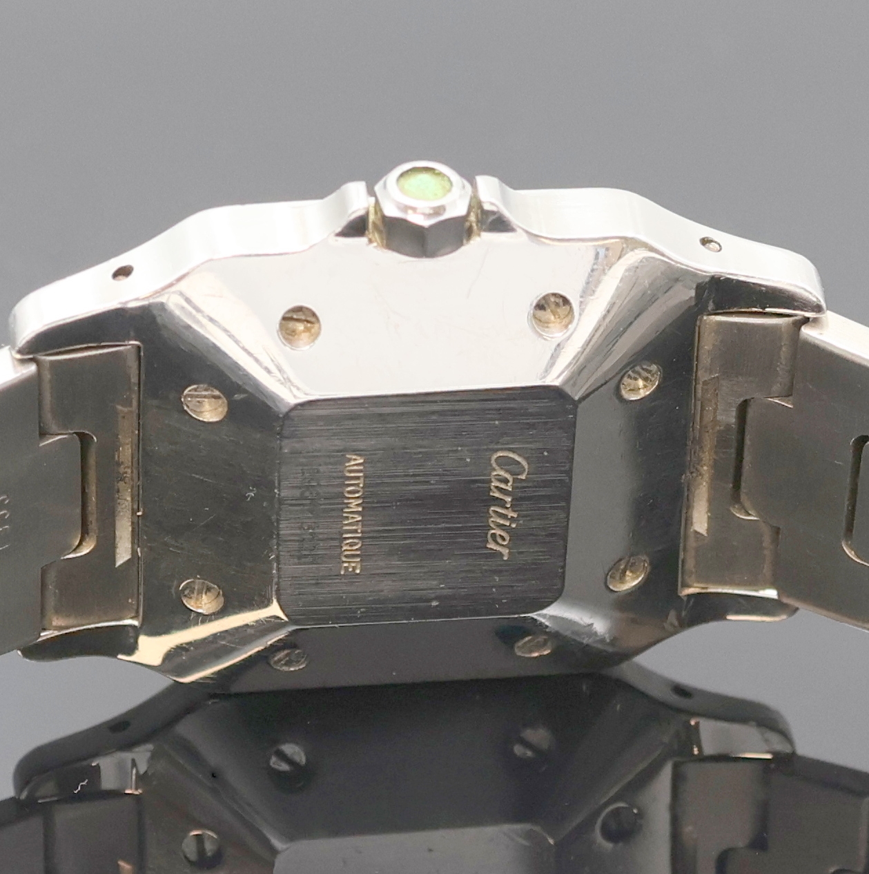 Detail e: CARTIER Santos Herrenarmbanduhr in Edelstahl/Gold, Schweiz um 1990, Automatik, Monocoque-Geh., orig. Gliederband m. dopp. Faltschl., Schmuckkrone ...