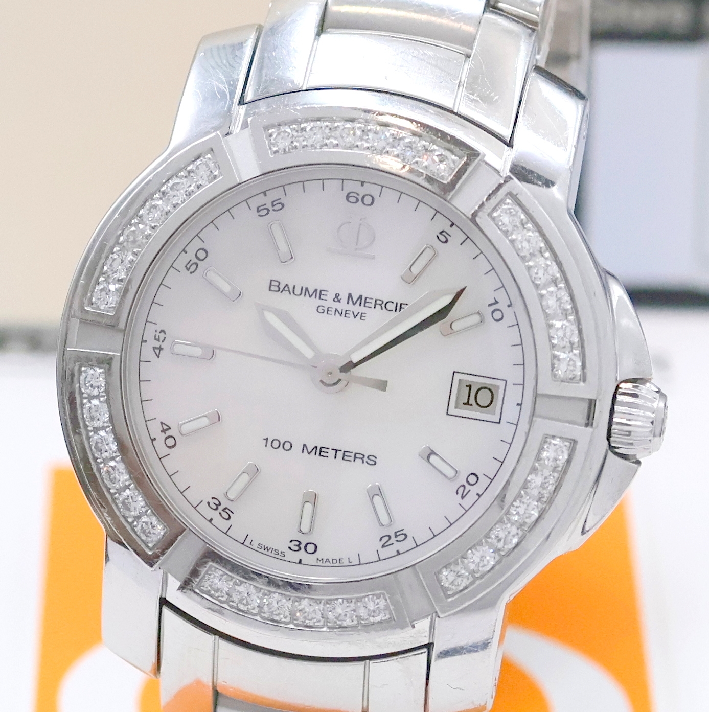 Detail a: BAUME & MERCIER Capeland Armbanduhr in Edelstahl Referenz 65435, Schweiz verk. lt. beil. Pap. 12/2004, quarz, orig. Gliederband m. dopp. Faltschl., ...
