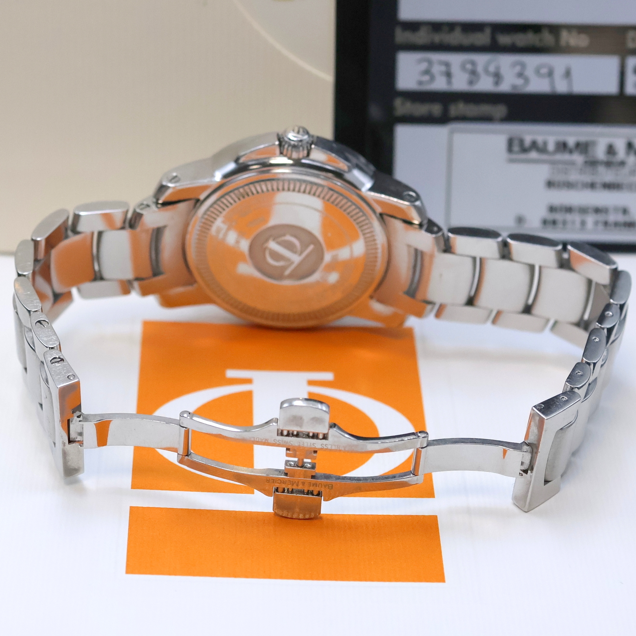 Detail b: BAUME & MERCIER Capeland Armbanduhr in Edelstahl Referenz 65435, Schweiz verk. lt. beil. Pap. 12/2004, quarz, orig. Gliederband m. dopp. Faltschl., ...
