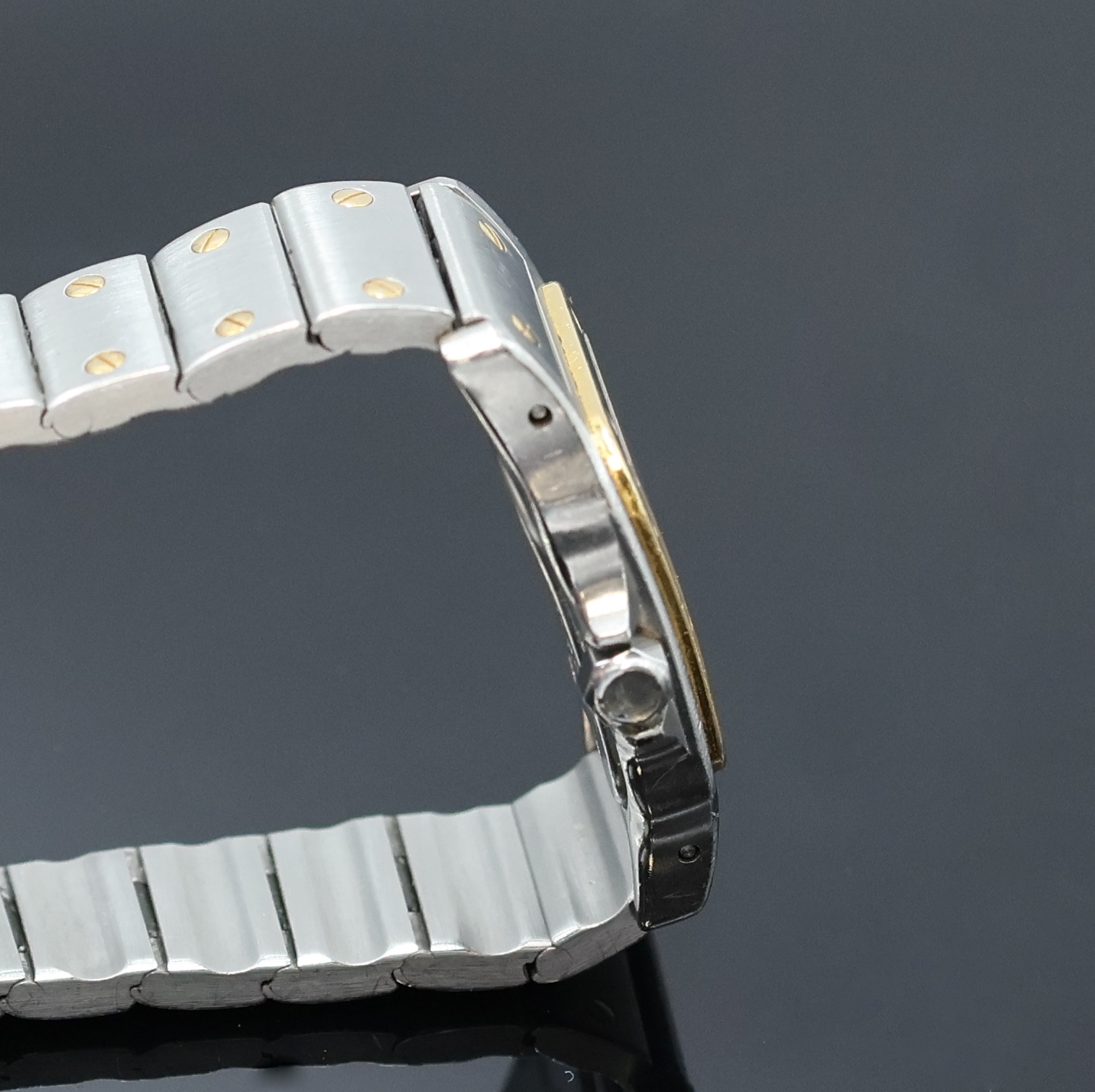 Detail c: CARTIER Santos Armbanduhr in Edelstahl/Gold Referenz 1057930, Schweiz um 1990, quarz, Boden 8-fach verschr., Schmuckkrone (Stein fehlt), orig. ...