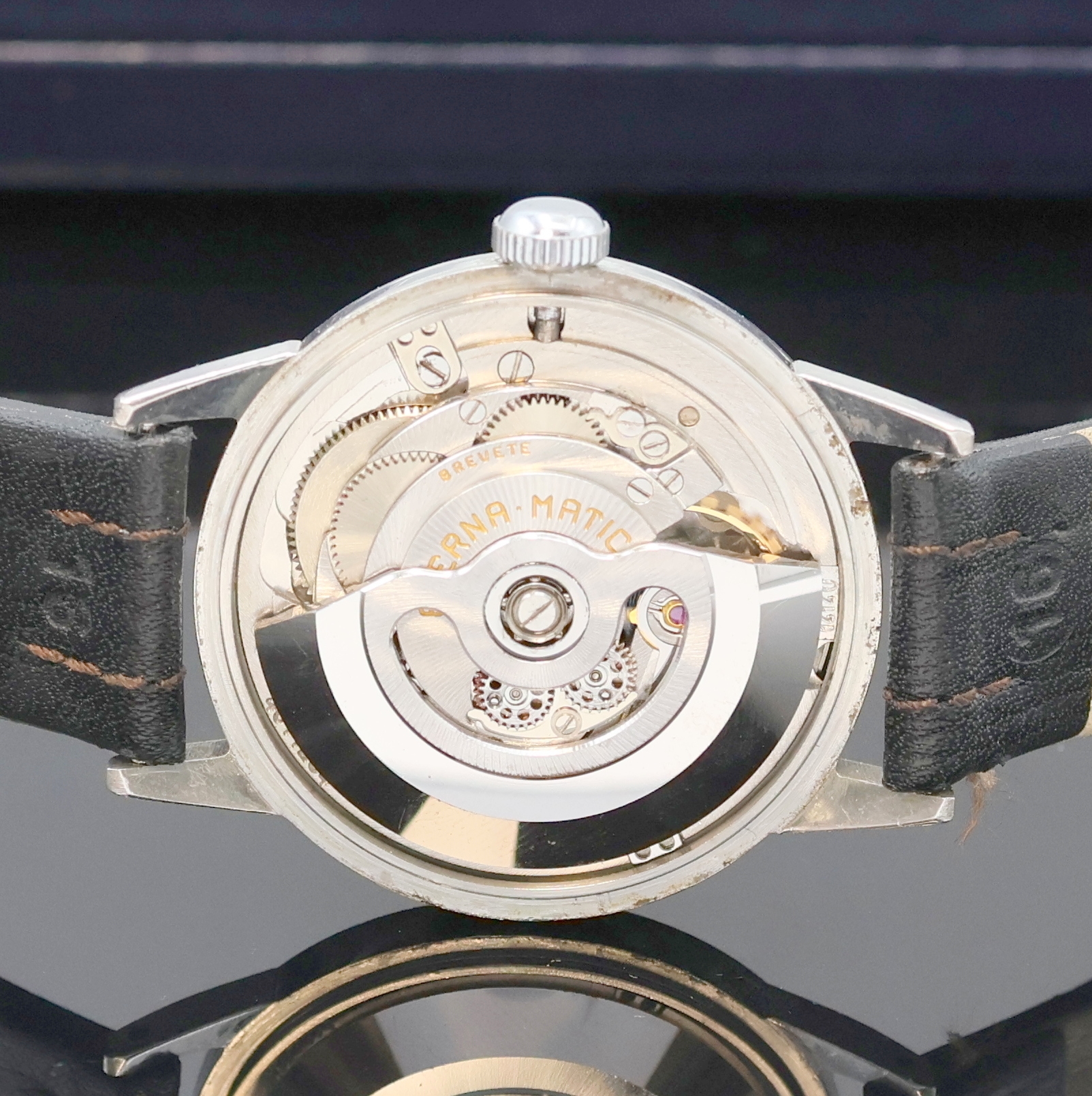Detail d: ETERNA-MATIC Armbanduhr in Edelstahl, Schweiz um 1990, Automatik, 3-teil. Geh., Boden u. Glasrand aufgedr., silb. Zifferbl. m. gold. Ind. u. silb. ...