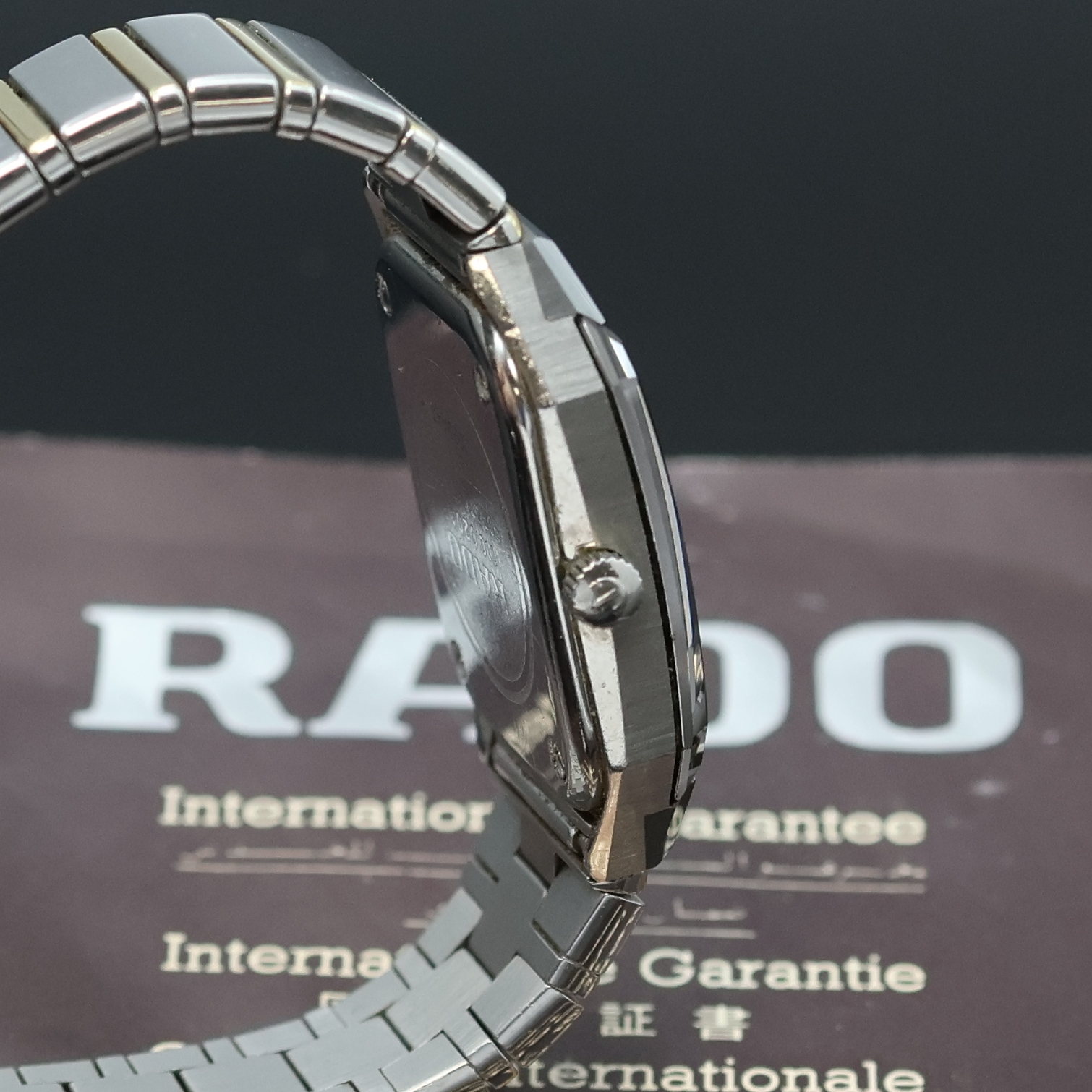 Detail c: RADO DiaStar Jubile Armbanduhr in Stahl Referenz 110.02043, Schweiz verk. lt. Garantie 11/1985, quarz, Boden 4-fach verschr., Gliederband m. dopp. ...
