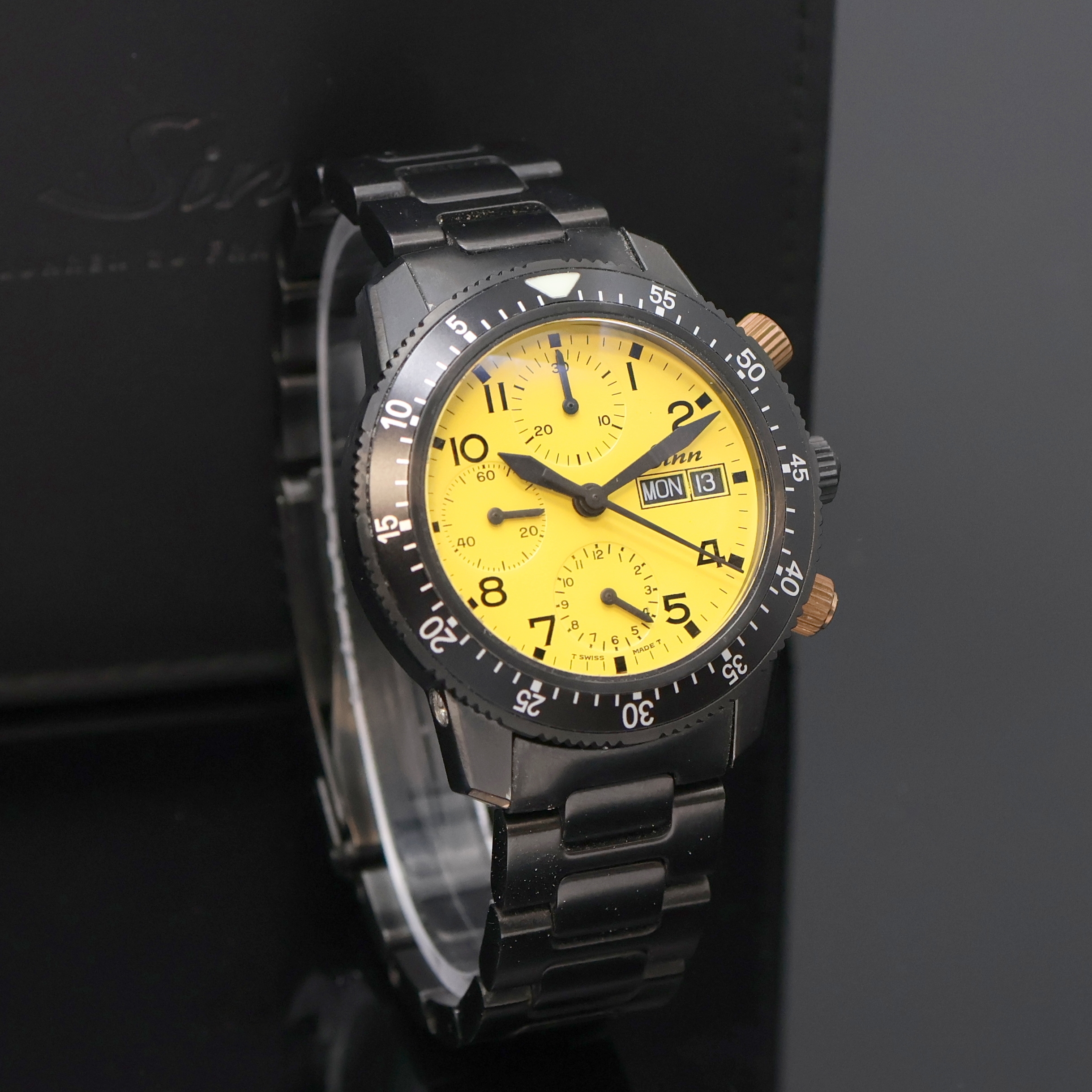 Detail b: SINN Armbandchronograph Referenz 103.28454, Schweiz um 2000, Automatik, geschw. Edelstahlgeh. inkl. Stahlband m. Faltschl., beids. vergl., Boden u. ...