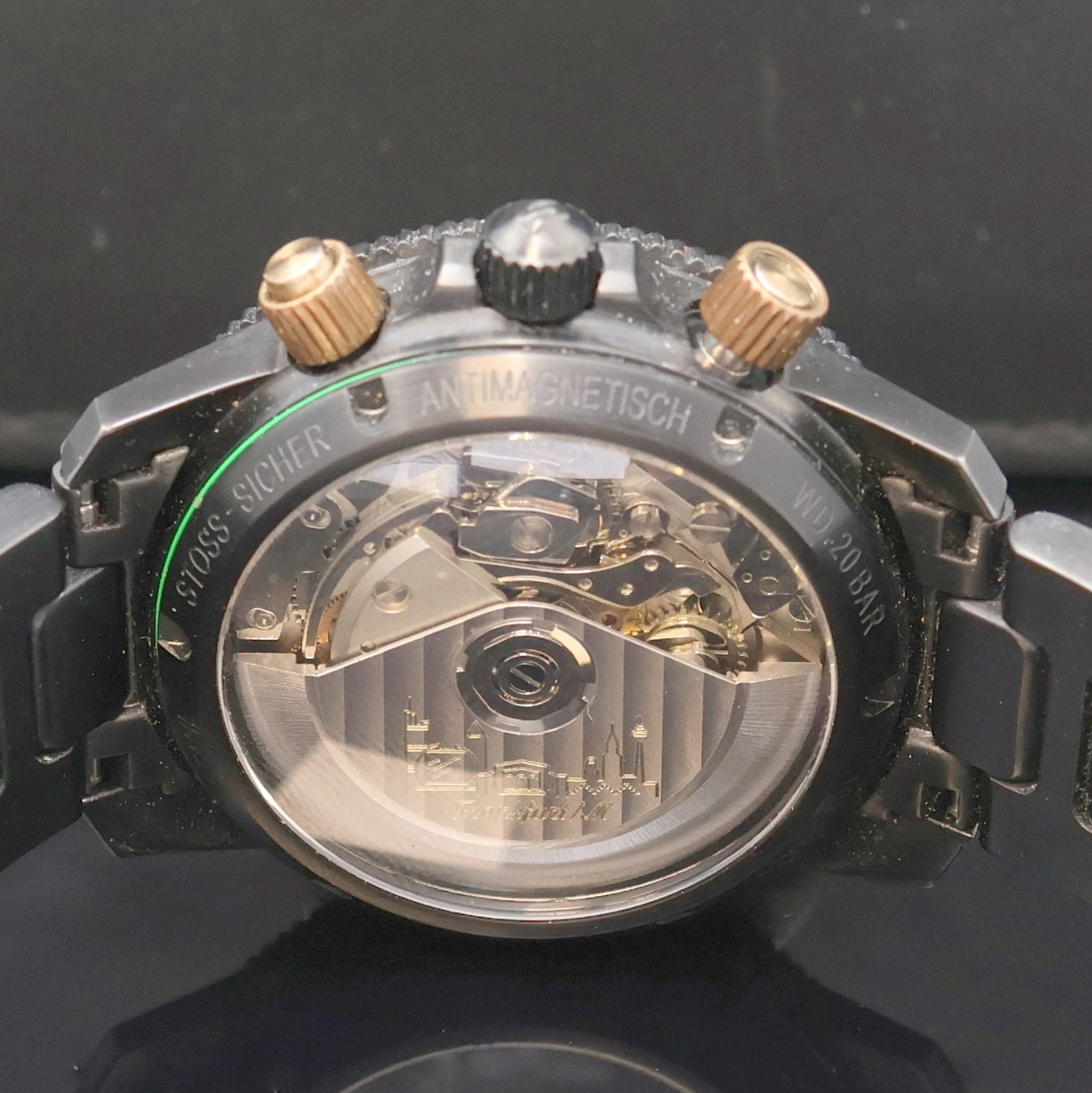 Detail e: SINN Armbandchronograph Referenz 103.28454, Schweiz um 2000, Automatik, geschw. Edelstahlgeh. inkl. Stahlband m. Faltschl., beids. vergl., Boden u. ...
