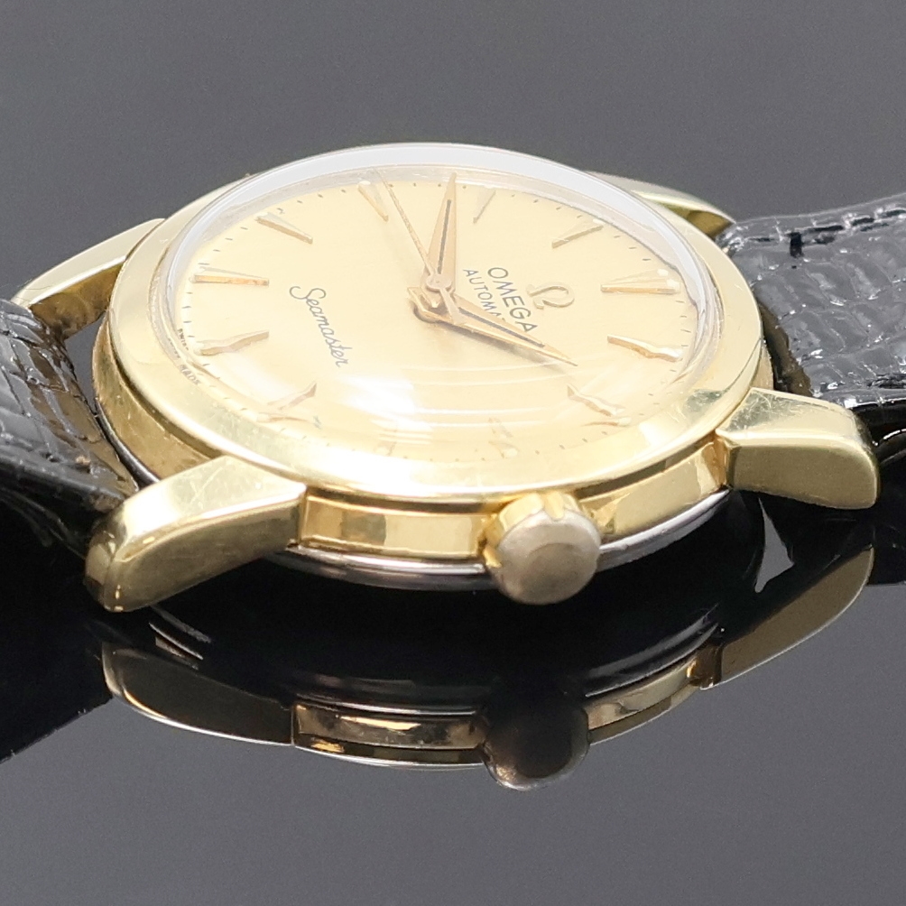 Detail b: OMEGA Seamaster Armbanduhr in Stahl/Gold Referenz 2828-11 SC, Schweiz um 1956, Automatik, 2-teil. Geh., Boden aufgedr., gold. Zifferbl. rest., ...