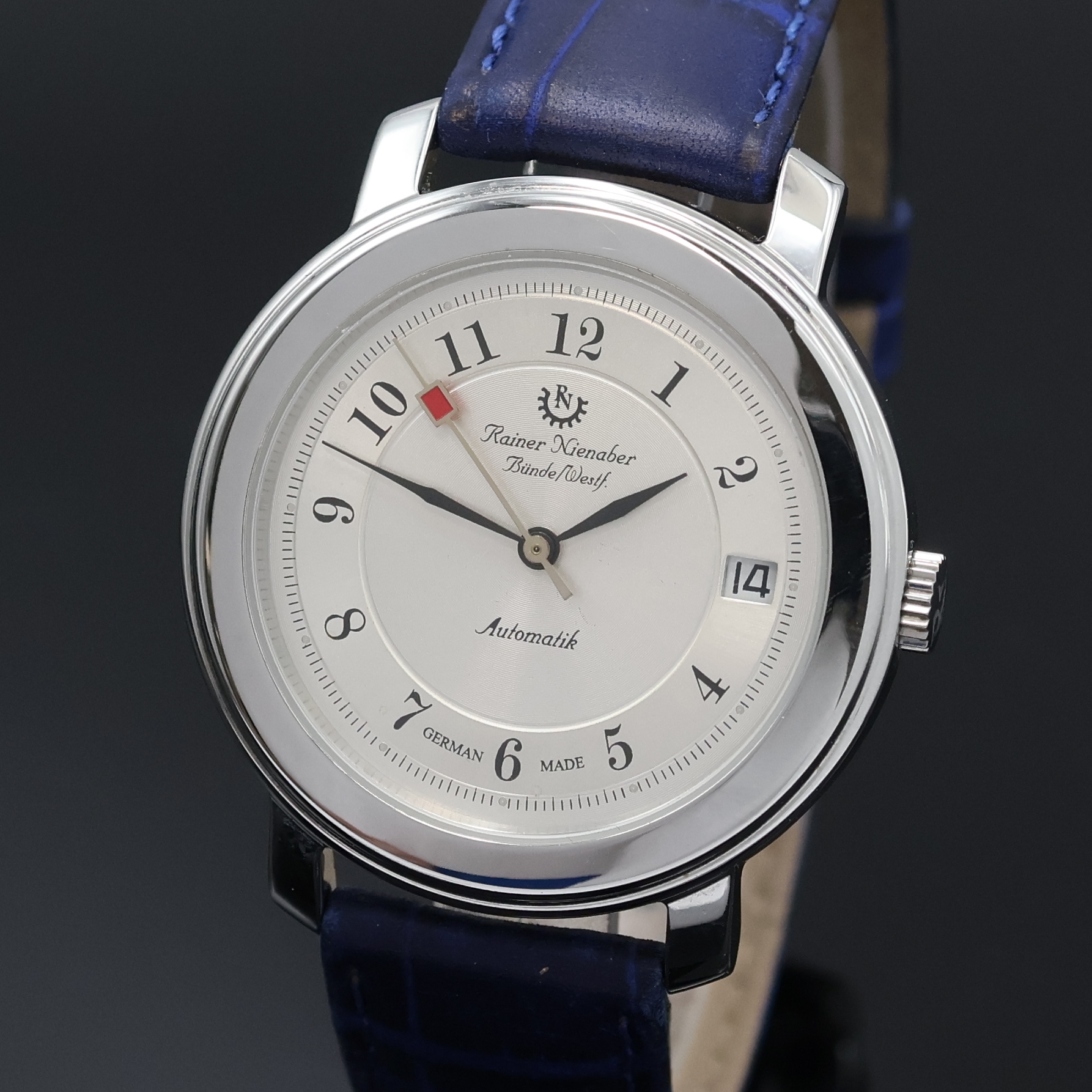 Detail a: RAINER NIENABER auf 50 Stück limitierte Armbanduhr in Stahl, Deutschland lt. orig. Pap. verk. 05/1998, Automatik, beids. vergl. Edelstahlgeh., Boden ...