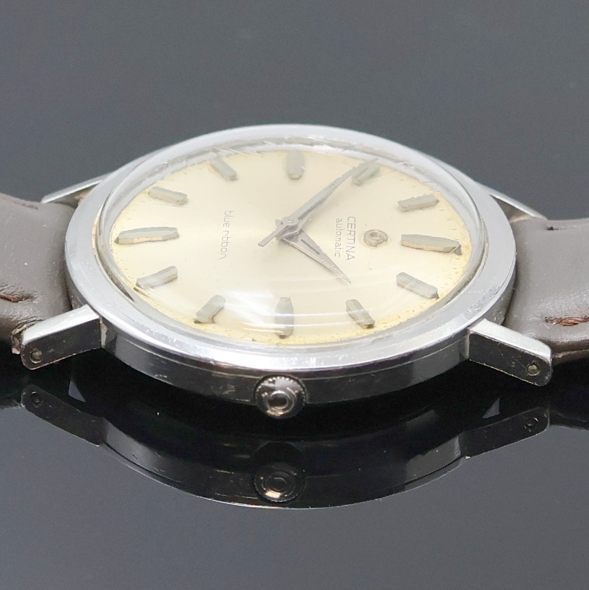 Detail b: CERTINA Blue Ribbon Armbanduhr Referenz 5601 103, Schweiz um 1965, Automatik, Edelstahlgeh., Boden verschr., orig. Krone in Geh. eingel., silb. ...