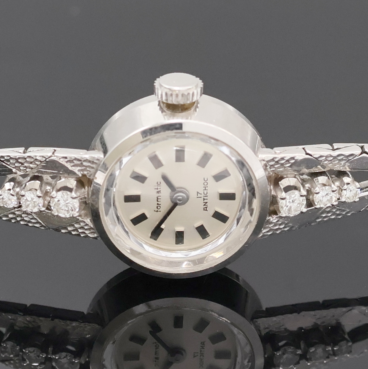 Detail a: FORMATIC Damenarmbanduhr in WG 585/000, Schweiz um 1960, Handaufzug, 2-teil. Geh. inkl. Goldband m. 6 Diamanten u. Klappschl., Boden aufgedr., silb. ...