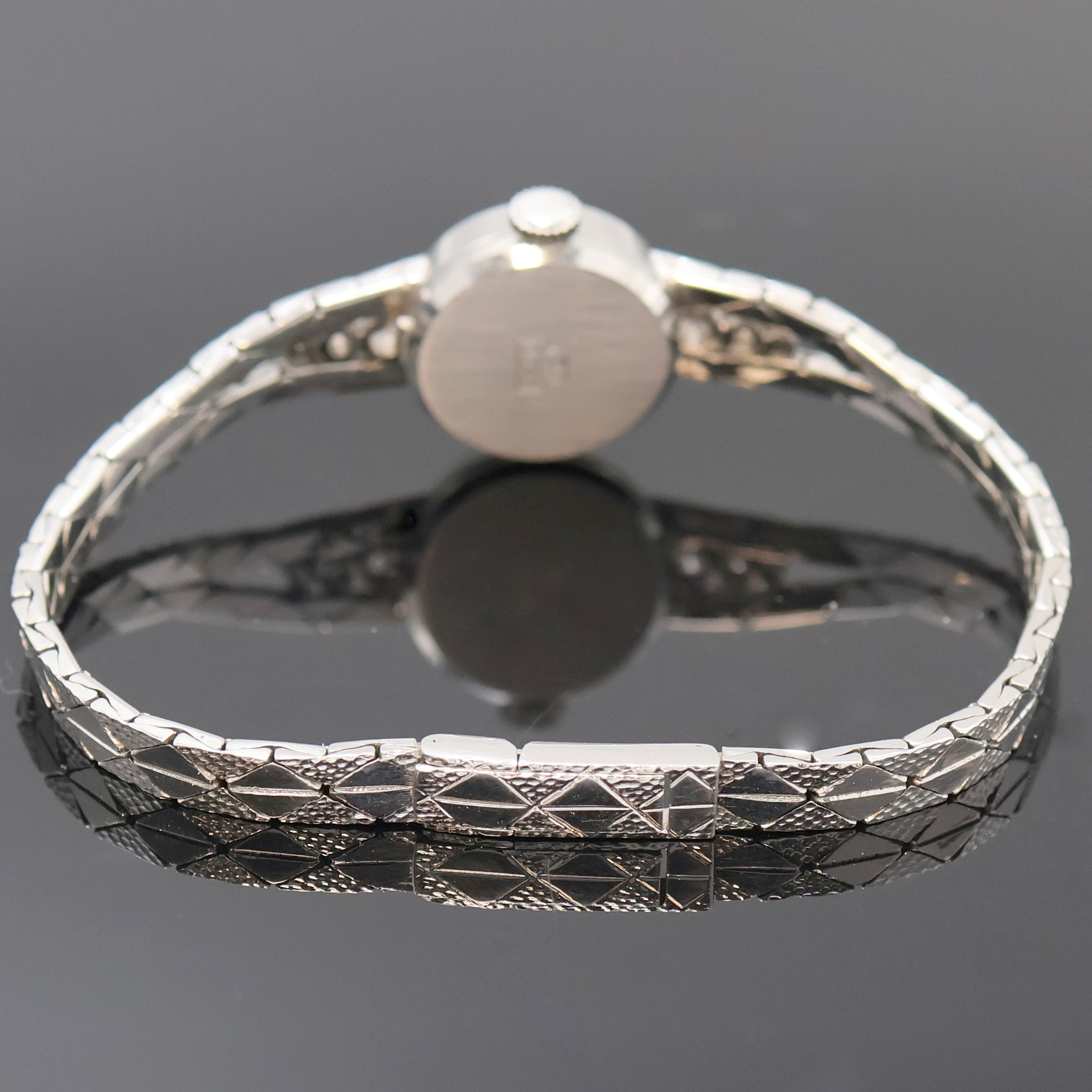 Detail b: FORMATIC Damenarmbanduhr in WG 585/000, Schweiz um 1960, Handaufzug, 2-teil. Geh. inkl. Goldband m. 6 Diamanten u. Klappschl., Boden aufgedr., silb. ...