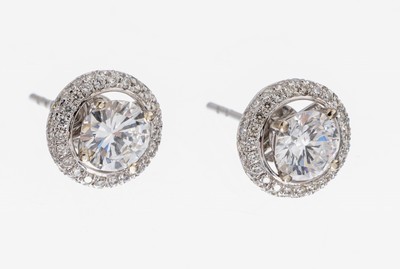 Image Paar 18 kt Gold Brillant-Ohrstecker, WG 750/000, 2 Brillanten, 1 x 0.54 ct hochfeines ...