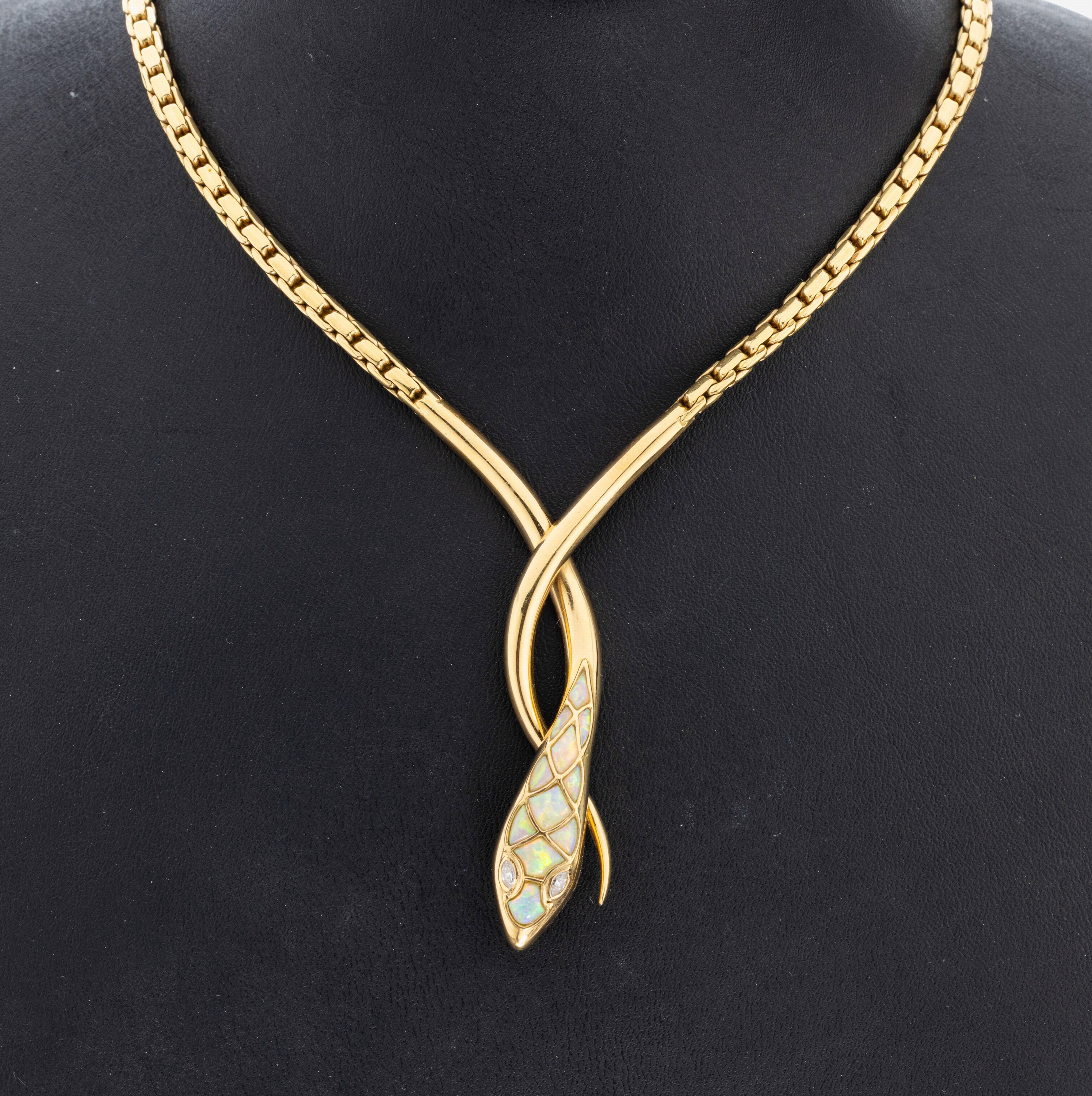 18 kt Gold Opal-Diamant-Schlangencollier, GG 750/000, Kopf ausgefasst mit Opalen zus. ca. 2.0 ct, Farbspiel in rot, grün, blau und gelb, 2 ...