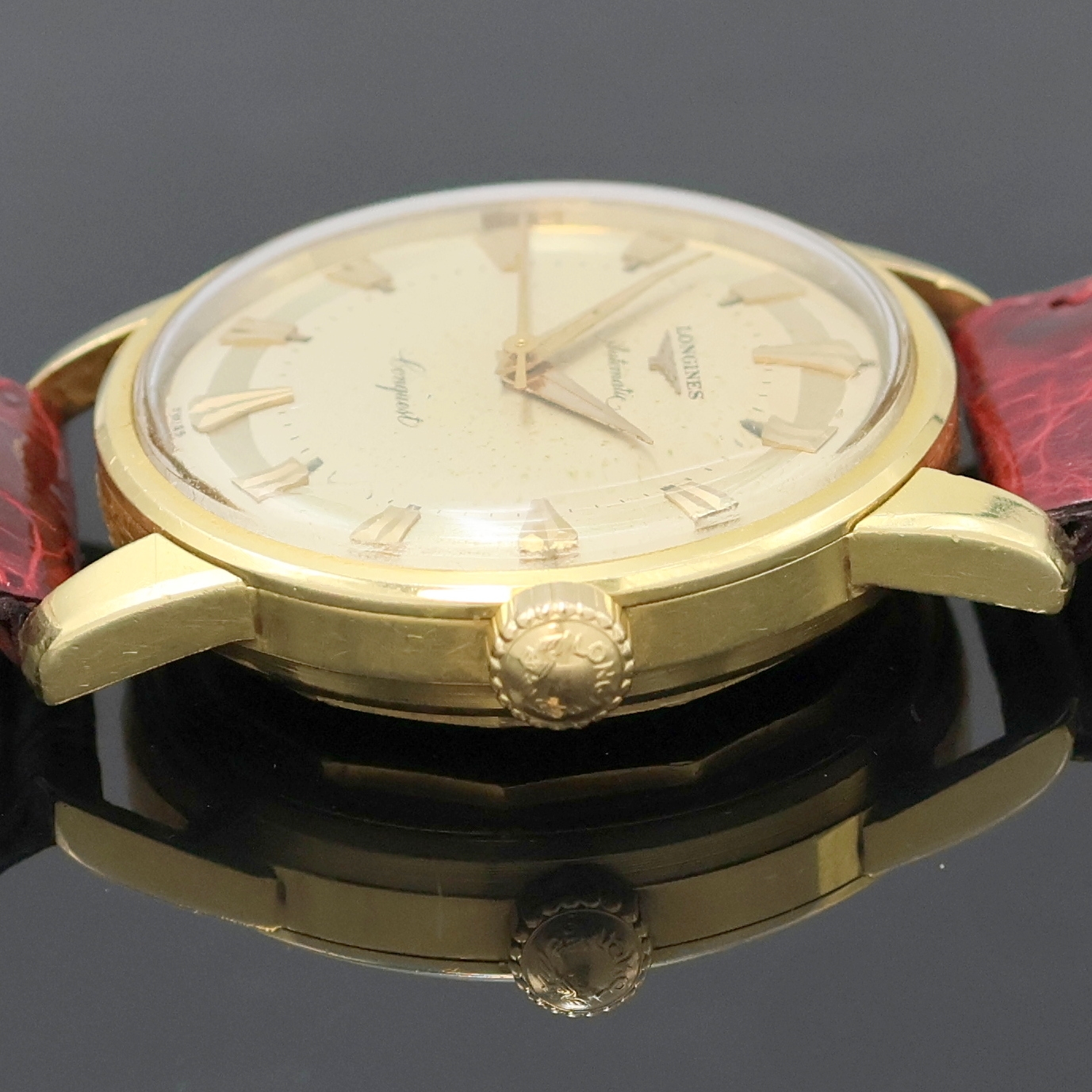 Detail d: LONGINES Conquest Armbanduhr in GG 750/000 Referenz 9001, Schweiz um 1958, Automatik, Boden m. Emailplakette verschr., orig. Krone, silb. Zifferbl. ...