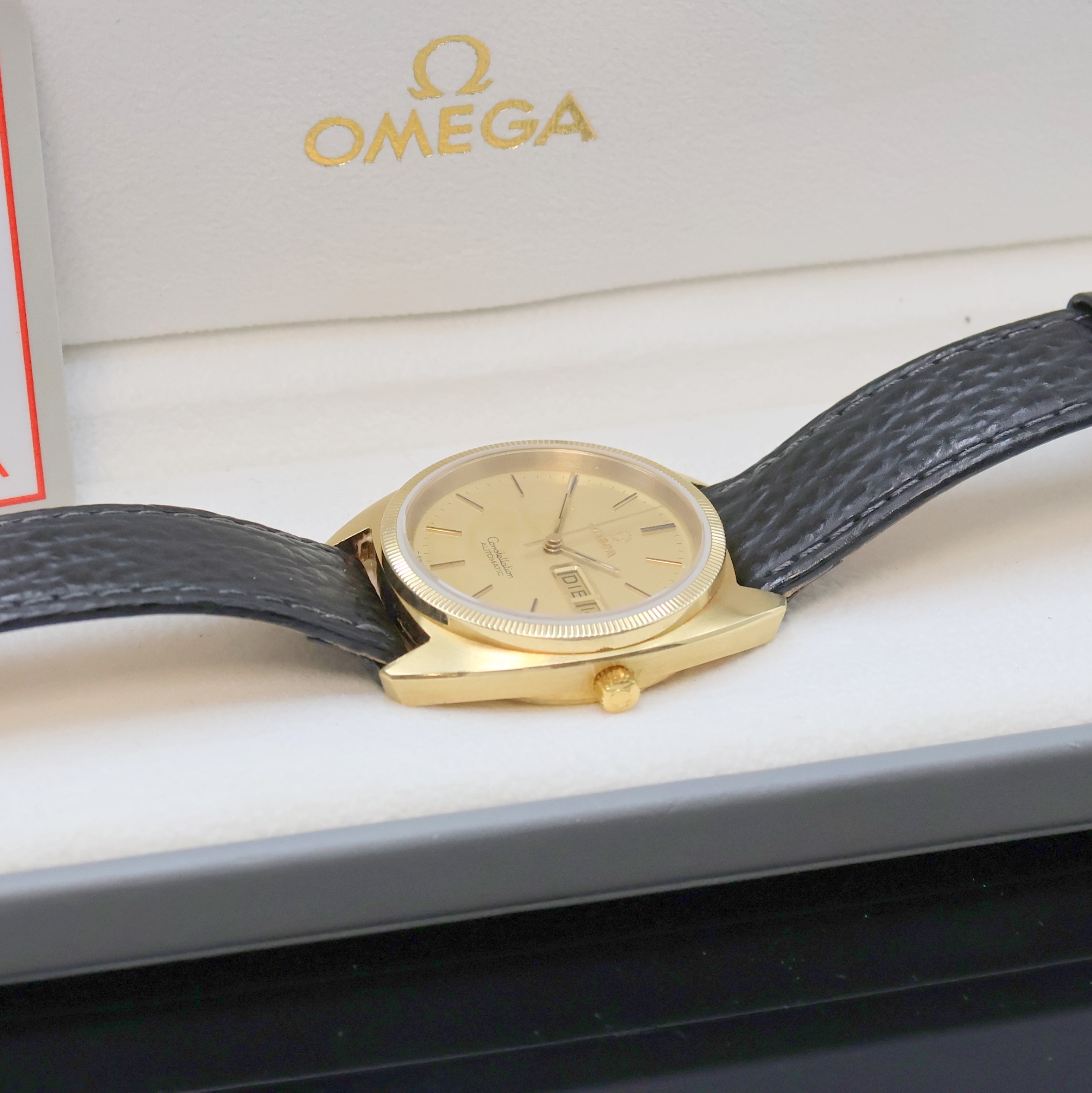 Detail g: OMEGA Constellation Armbanduhr in GG 750/000 Referenz 168.0057, Schweiz um 1972, Automatik, Boden verschr., champagnerfarb. Zifferbl. m. aufges. ...