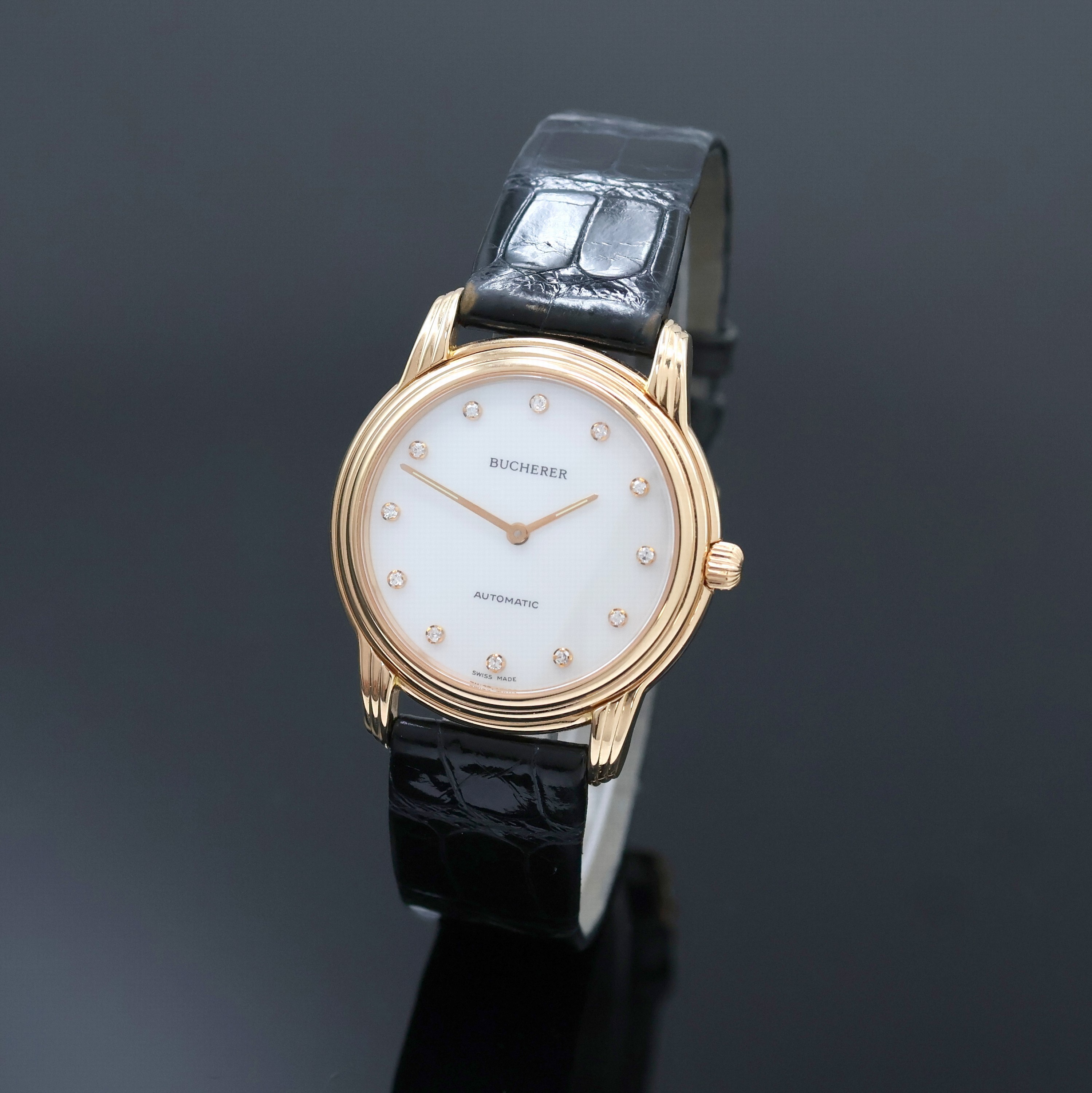 Image 27022606 - BUCHERER elegante Armbanduhr in RG 750/000, Schweiz um 1995, Automatik, beids. vergl. ...
