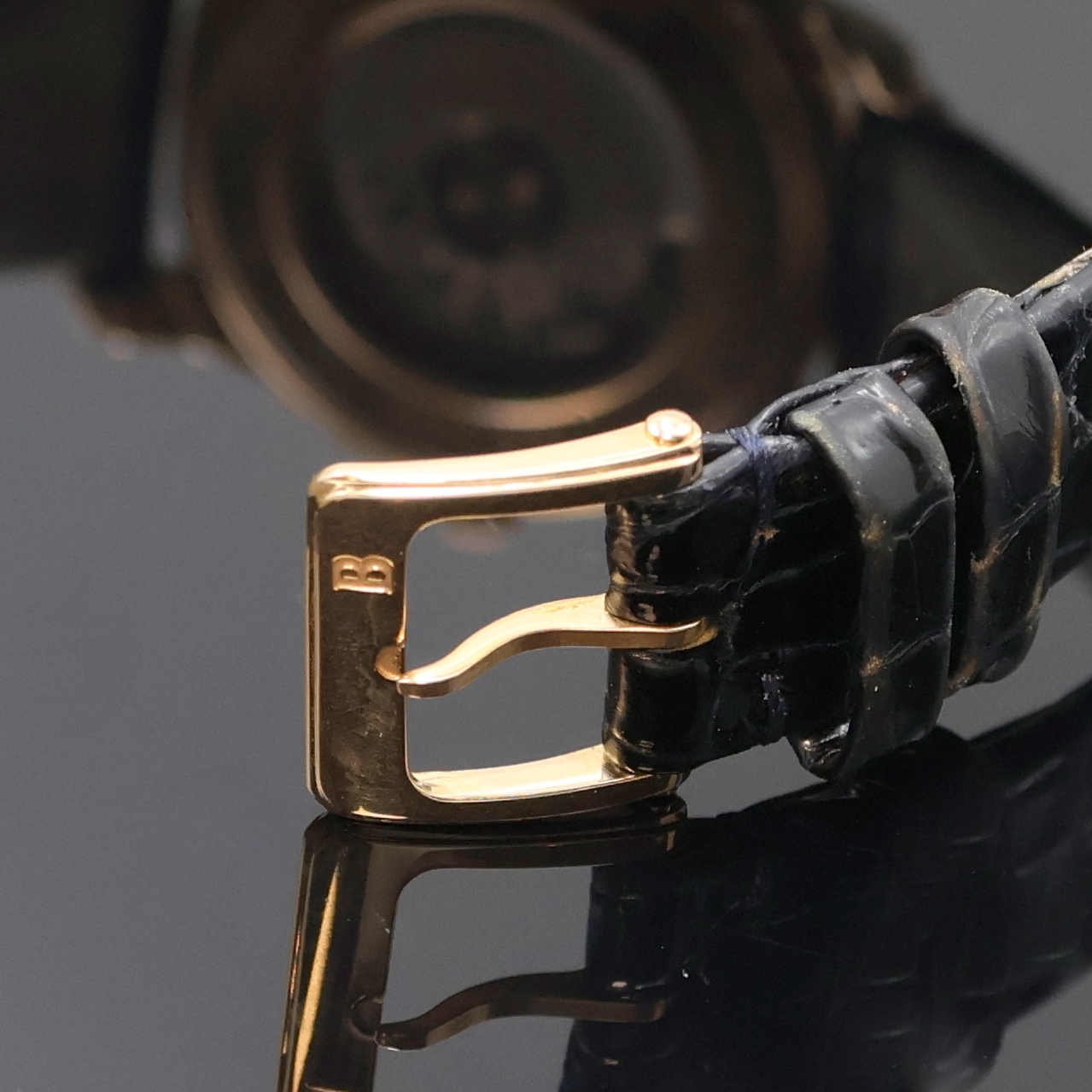 Detail b: BUCHERER elegante Armbanduhr in RG 750/000, Schweiz um 1995, Automatik, beids. vergl. Geh. inkl. orig. Lederband m. orig. RG 750/000 Dornschl., Boden ...