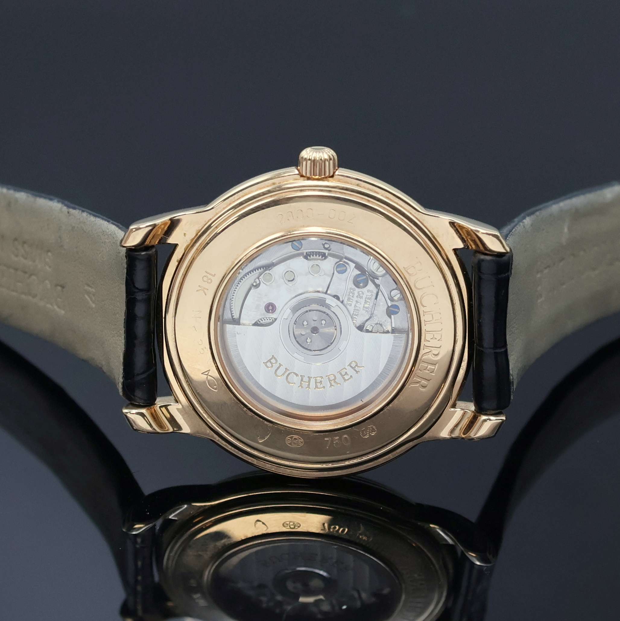 Detail e: BUCHERER elegante Armbanduhr in RG 750/000, Schweiz um 1995, Automatik, beids. vergl. Geh. inkl. orig. Lederband m. orig. RG 750/000 Dornschl., Boden ...
