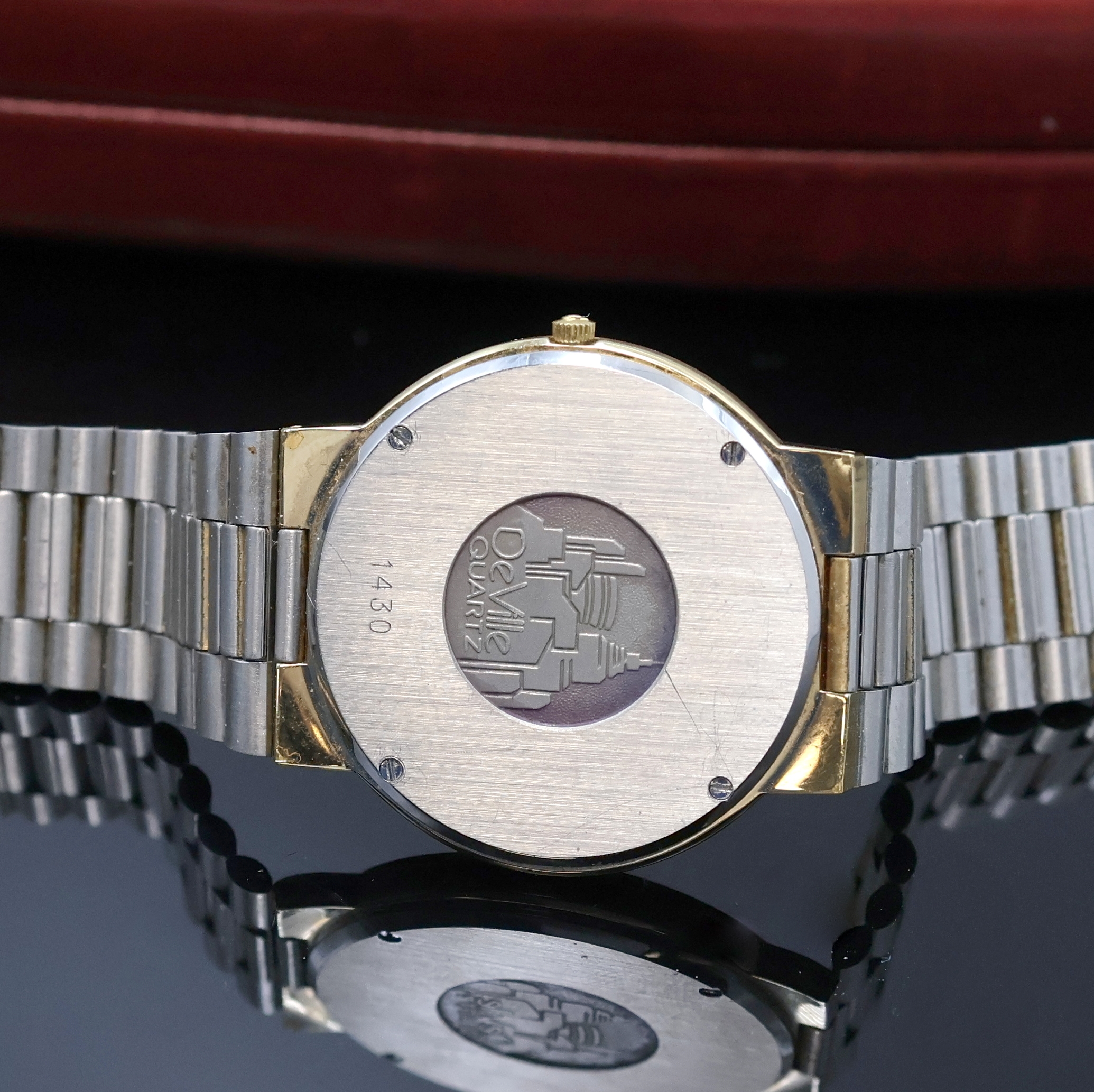 Detail d: OMEGA De Ville vergoldete Armbanduhr, Schweiz um 1985, quarz, Geh. inkl. verg. orig. Gliederband, Boden 4-fach verschr., goldfarb. Zifferbl. m. gold. ...