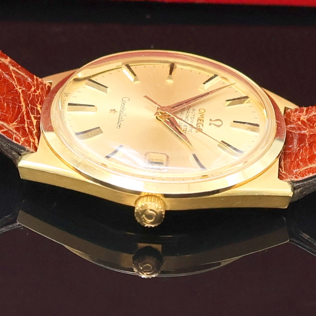 Detail b: OMEGA Constellation in GG 750/000 Referenz 168.011, Schweiz um 1970, Automatik, Monocoque-Geh., Rücks. m. Sternwarte, Zifferbl. in 750/000 GG m. ...