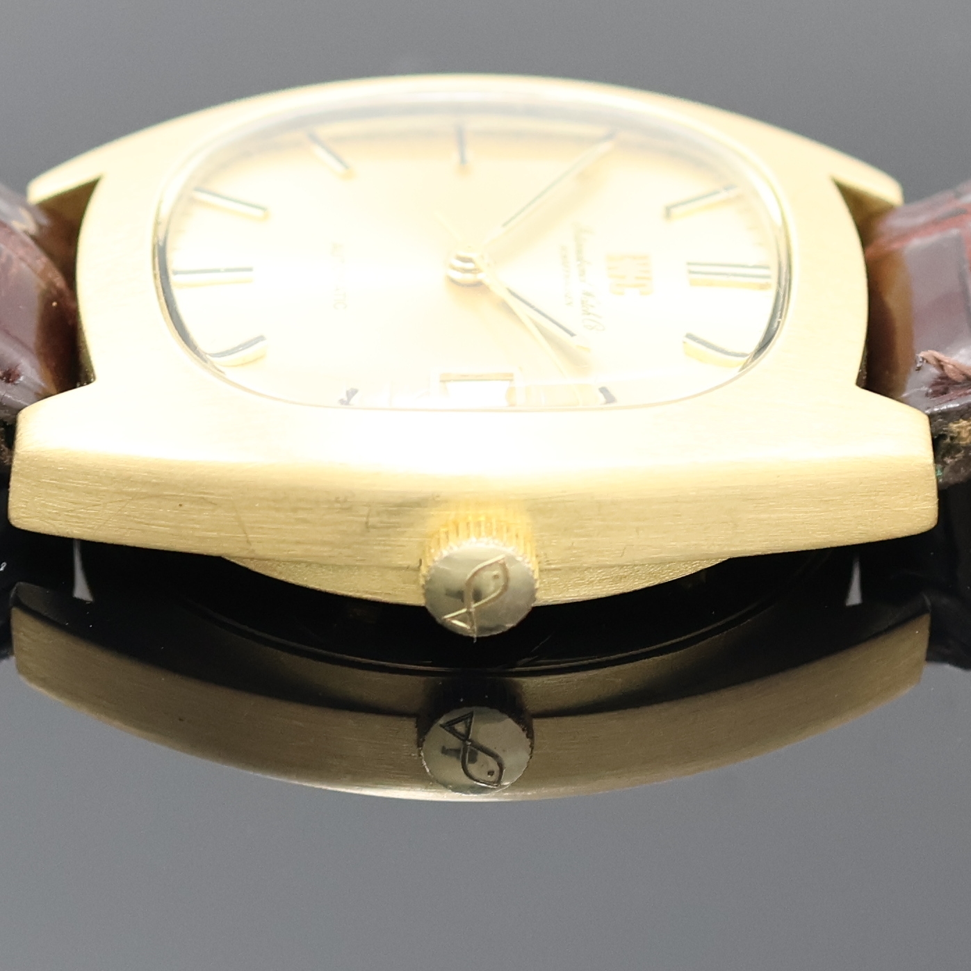 Detail c: IWC schwere Herrenarmbanduhr in GG 750/000, Schweiz um 1970, Automatik, 2-tlg. Geh., Boden verschr., orig. Krone, gold. Zifferbl., gold.Indizes u. ...