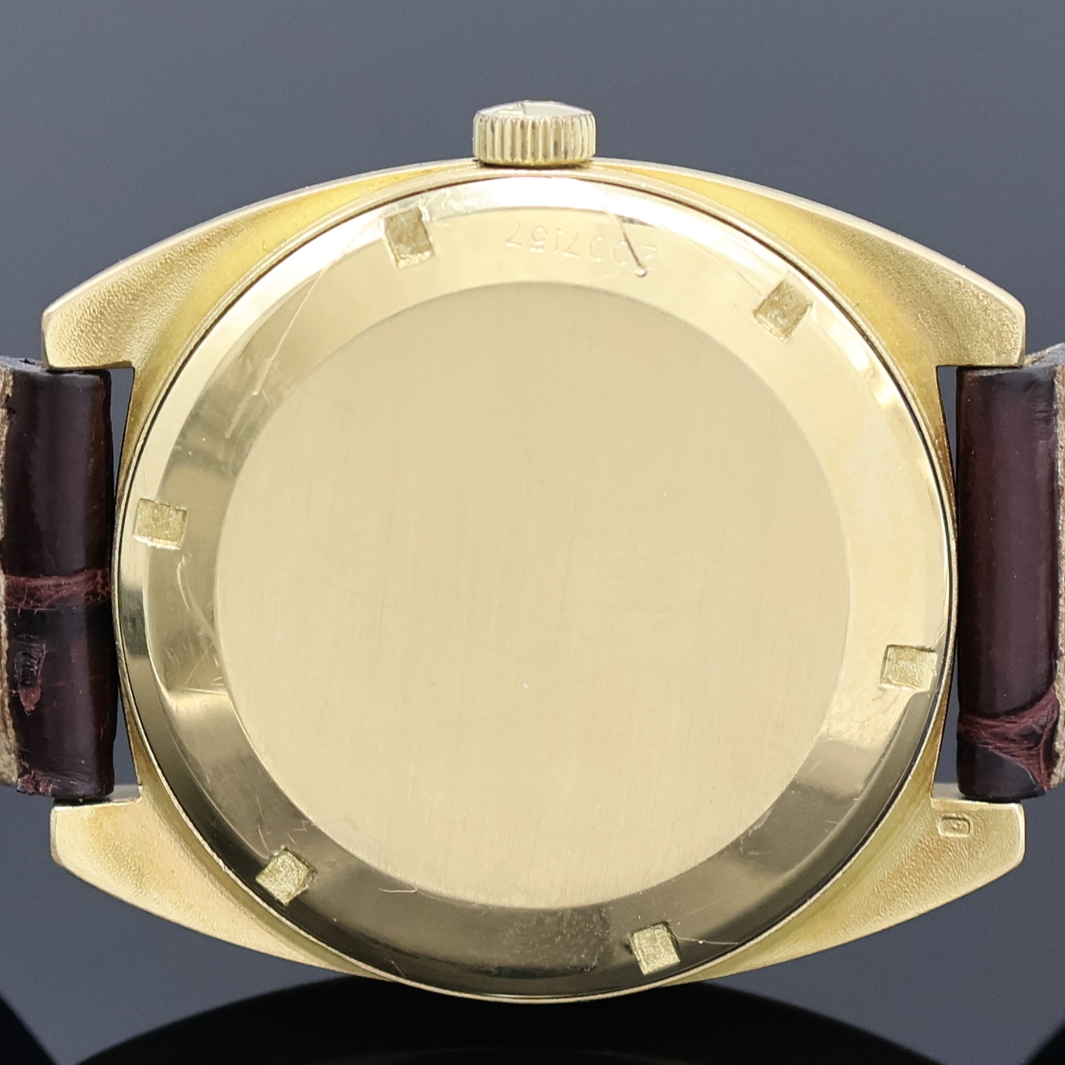 Detail d: IWC schwere Herrenarmbanduhr in GG 750/000, Schweiz um 1970, Automatik, 2-tlg. Geh., Boden verschr., orig. Krone, gold. Zifferbl., gold.Indizes u. ...