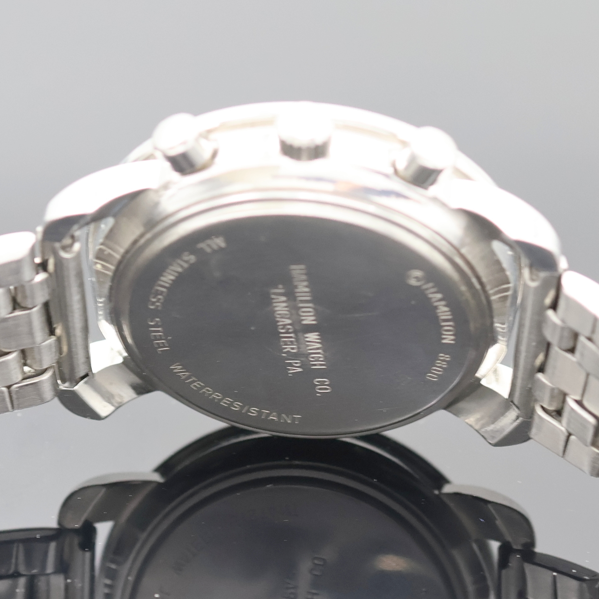 Detail d: HAMILTON Herrenchronograph Referenz 8800 in Stahl, Schweiz um 2000, quarz, 3-tlg. Geh., Boden aufgedr., Stahl Tachymeter-Lünette, neutrales ...