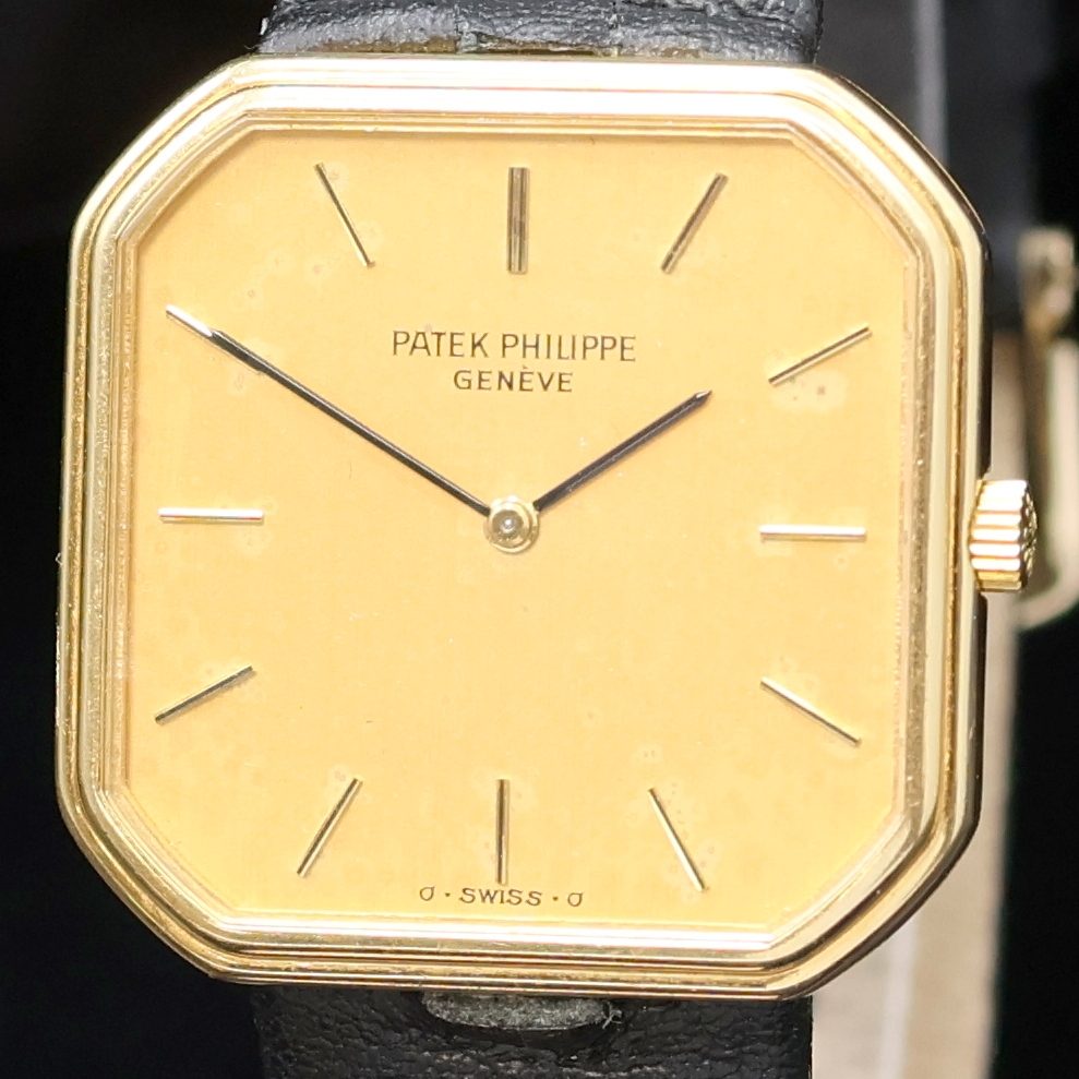 Detail a: PATEK PHILIPPE Armbanduhr Referenz 3854 in GG 750/000, Schweiz um 1980, Handaufzug, 8- eckiges Geh., Lünette aufgedr., beigefarb. Sigma Zifferbl. ...