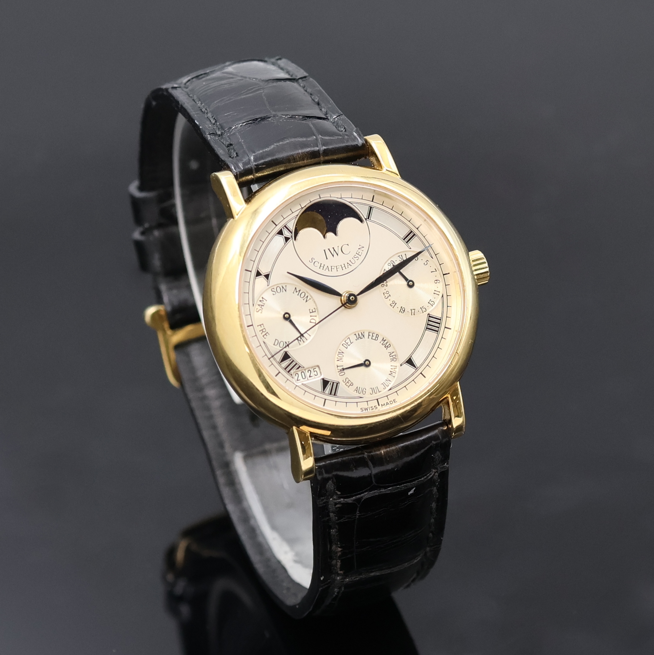 Detail b: IWC Portofino Armbanduhr mit ewigem Kalender in GG 750/000 Referenz 3541, Schweiz um 1990, Automatik, 2-tlg. Geh., Boden verschr., orig. Krone sowie ...